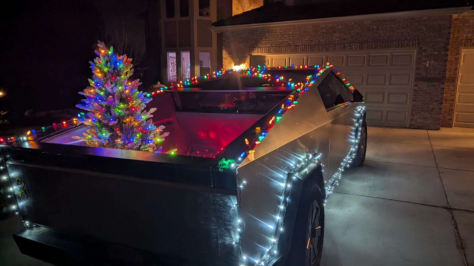Tesla Cybertruck Anyone else light up their Cybertruck for Christmas? PXL_20251213_003729841