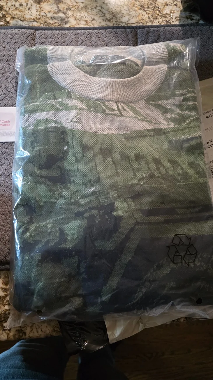 Tesla Cybertruck Holiday Sweaters are really nice!! 20251224_100153
