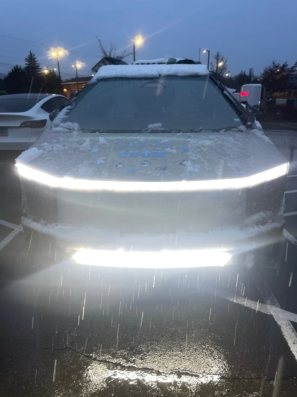 Tesla Cybertruck Would this solve snow blocking headlights? IMG_2021