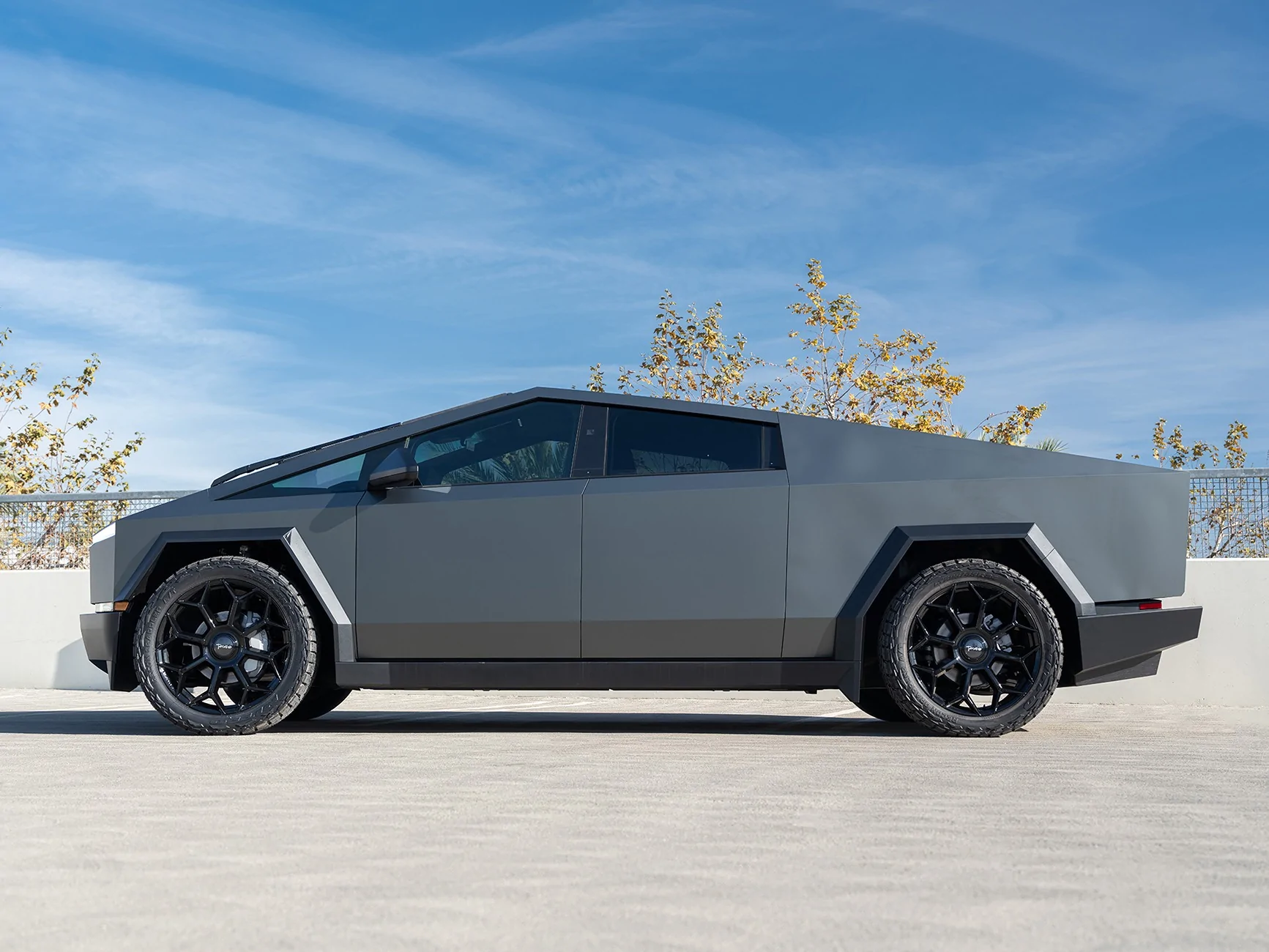 Tesla Cybertruck Installed Inozetek Satin Midnight Moss PPF Wrap kit at T Sportline 1 inozetek-satin-midnight-moss-tesla-cybertruck-24-inch-tc8-gloss-black-wheels-1920-2