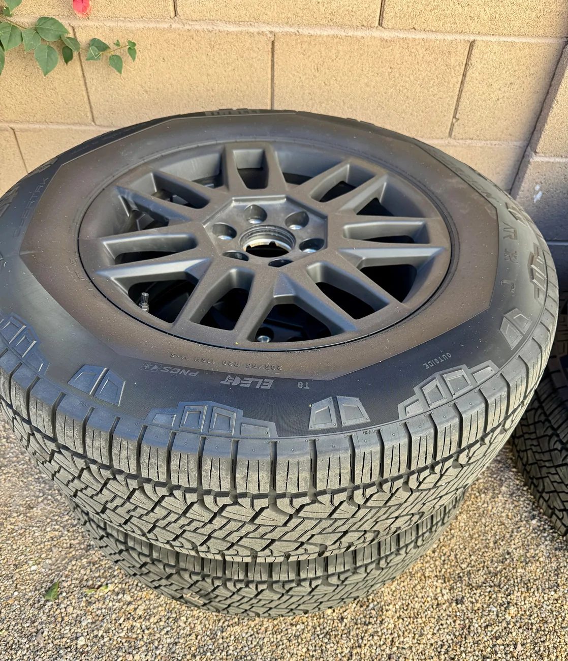Tesla Cybertruck FS - 2025 Tesla Cybertruck 20" OEM Core Wheels & Pirelli Scorpion Tires - Complete Set w/ TPMS & Covers TESLA CYBERTRUCK TIRES FRONT VIEW 1