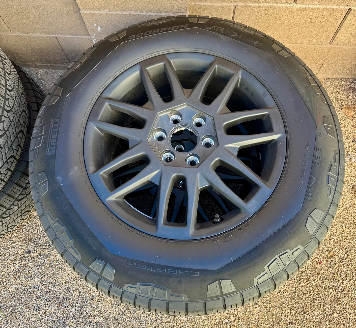 Tesla Cybertruck FS - 2025 Tesla Cybertruck 20" OEM Core Wheels & Pirelli Scorpion Tires - Complete Set w/ TPMS & Covers TESLA CYBERTRUCK WHEEL TIRE SET 1