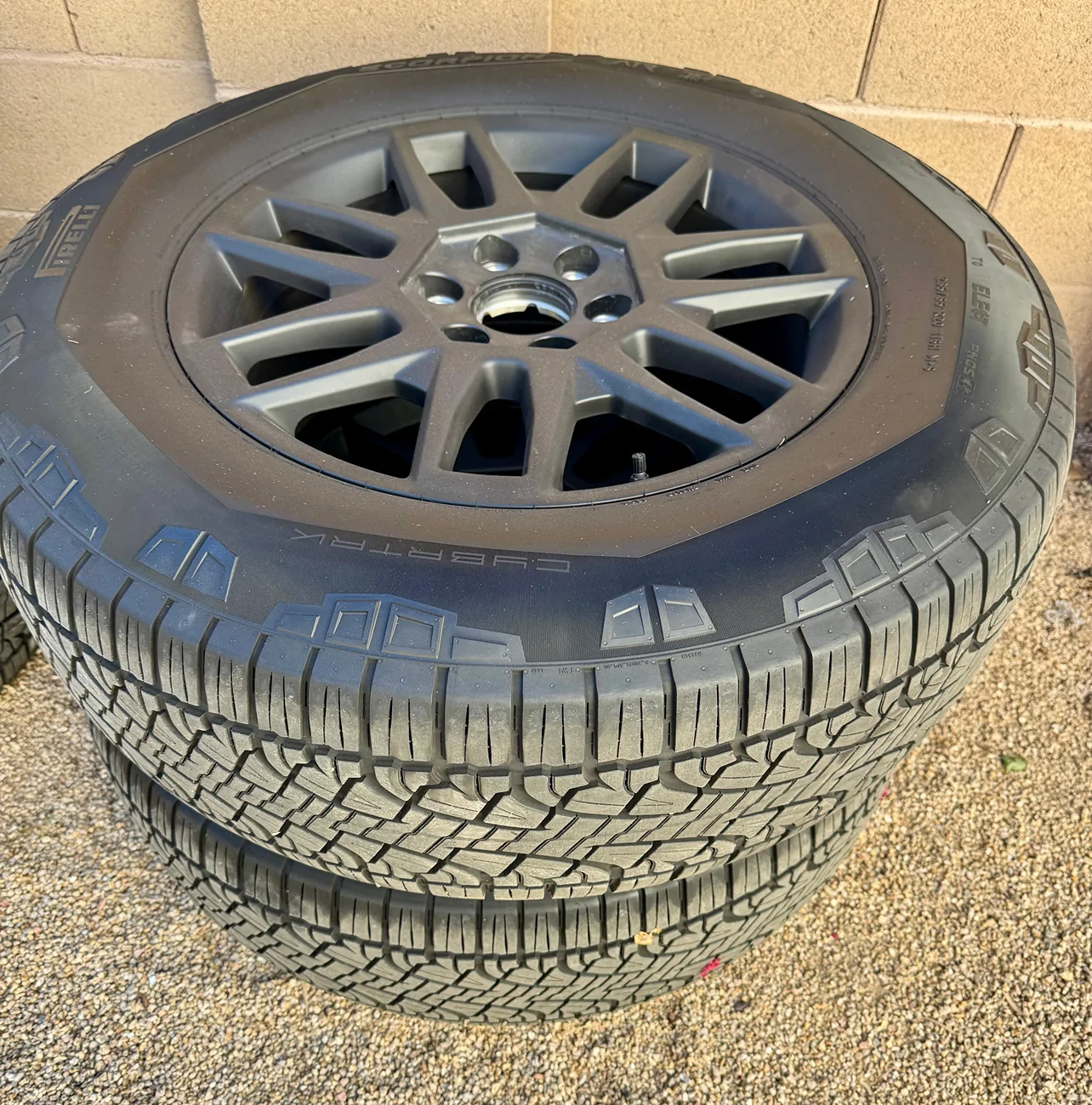 Tesla Cybertruck FS - 2025 Tesla Cybertruck 20" OEM Core Wheels & Pirelli Scorpion Tires - Complete Set w/ TPMS & Covers TESLA CYBERTRUCK TIRES FRONT VIEW 2