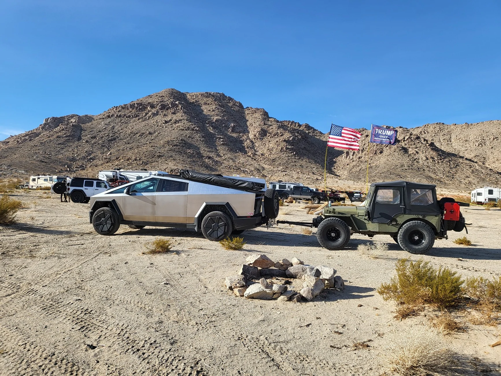 Tesla Cybertruck flat towing a Jeep behind a cybertruck 20250201_150156