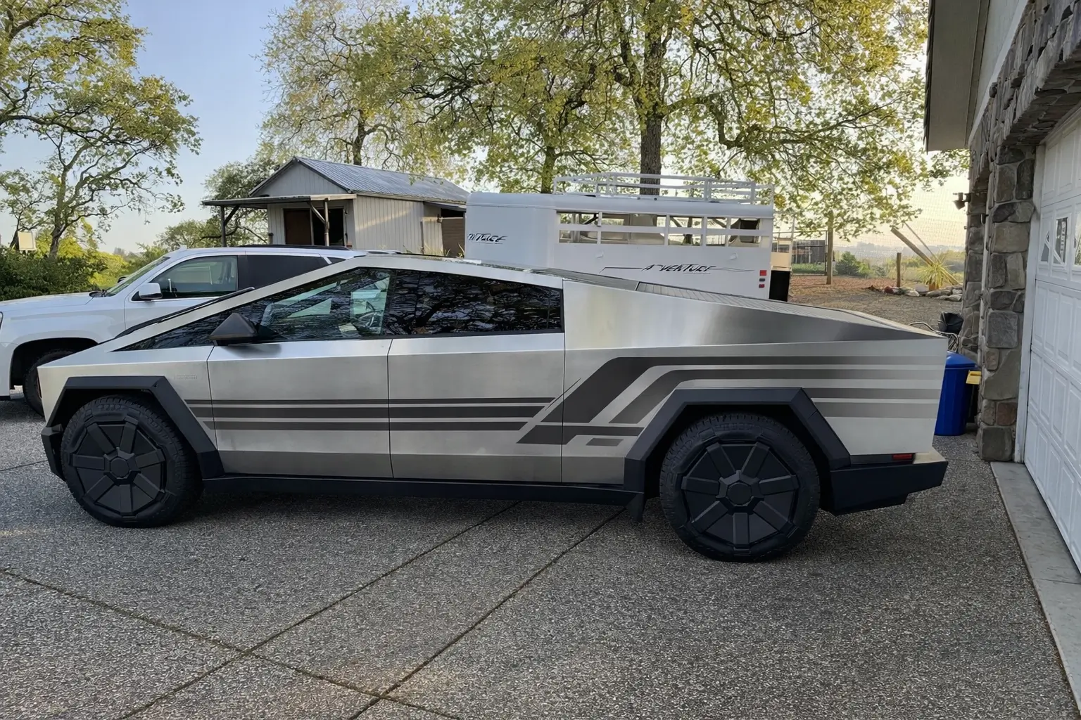 Tesla Cybertruck Adding graphics with vinyl decals on stainless steel (instead of full wrap) - experts please chime in! cybertruck graphics 2