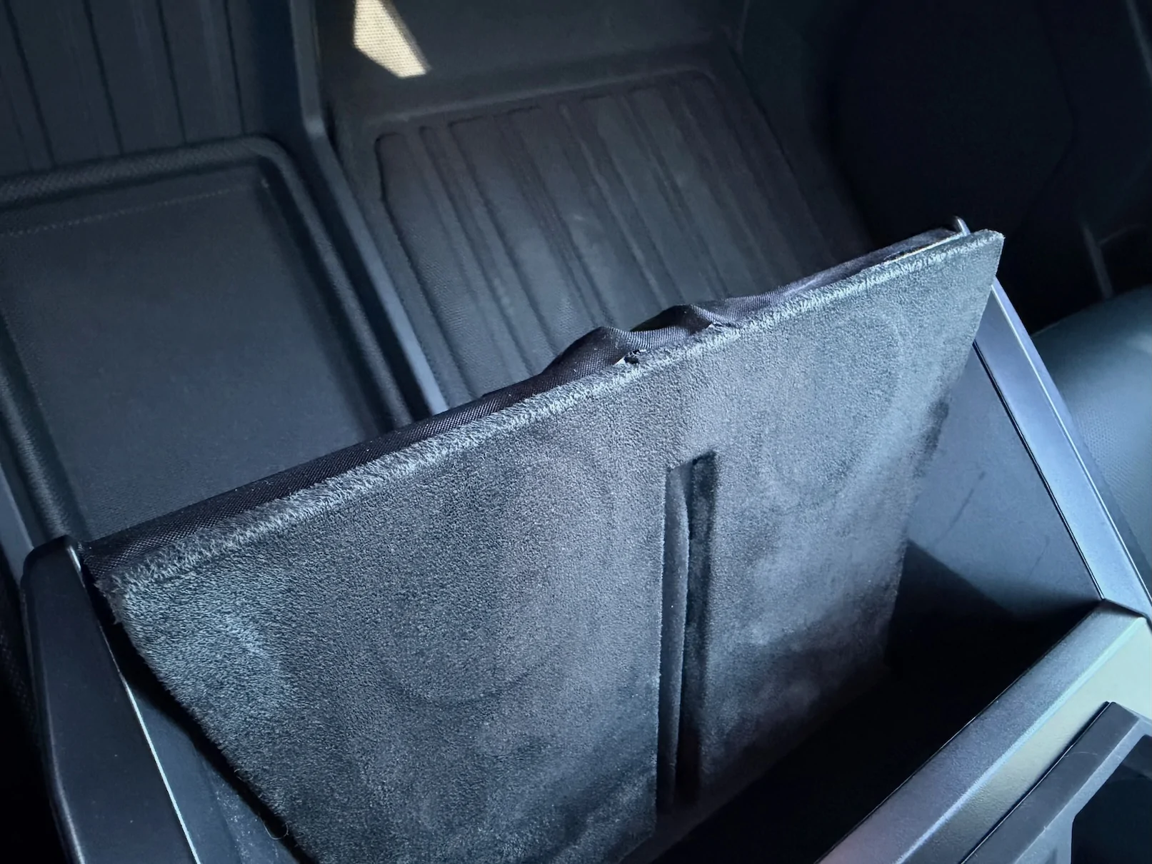 Tesla Cybertruck HARDWARE FIX for hot phone charging issue! New wireless charger has a built-in heatsink IMG_0799
