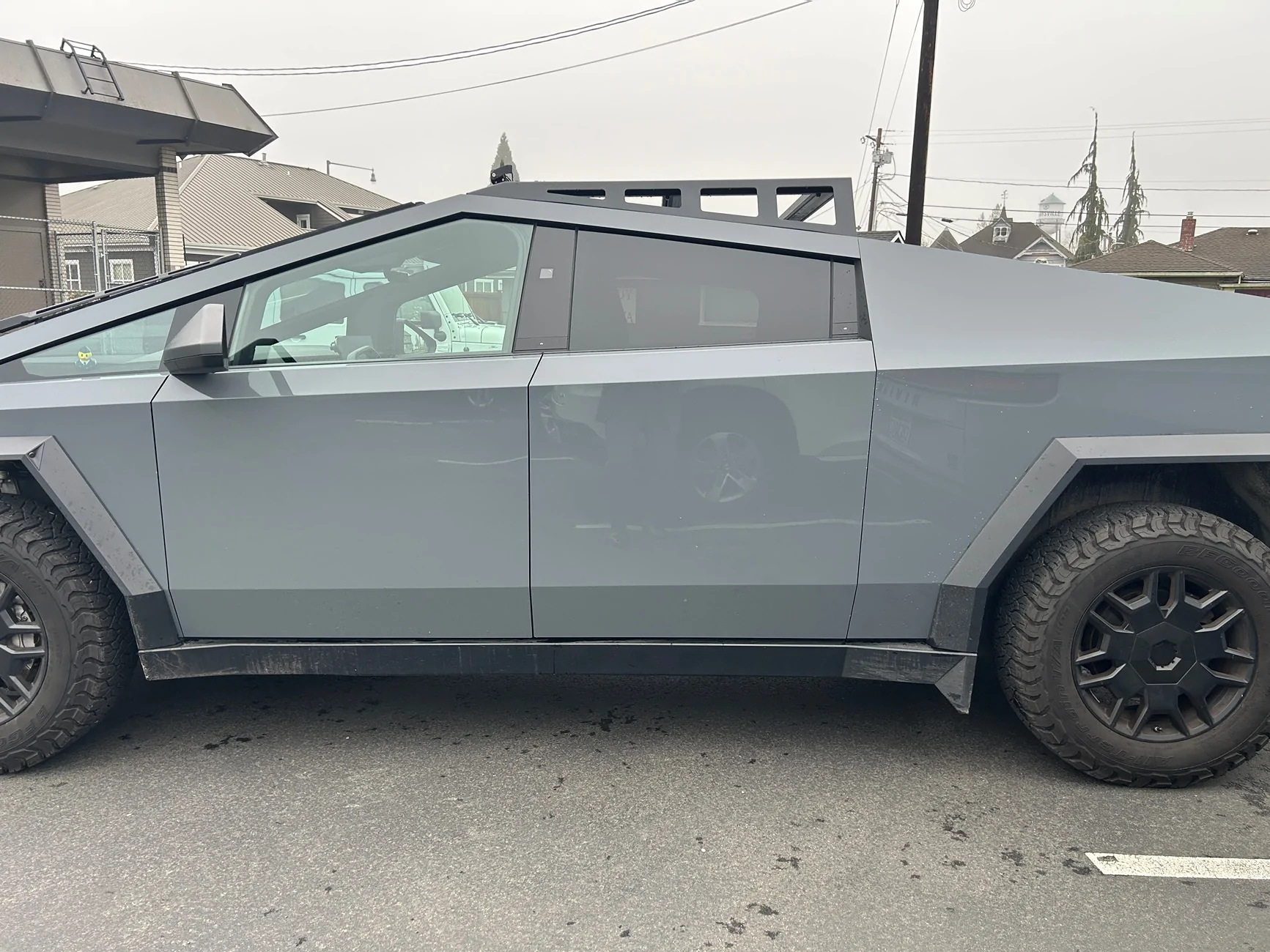 Tesla Cybertruck Showing off fresh Mars Adventure Gear mods: Expedition Rack (front only), wind deflector, and 50” lightbar. IMG_3697