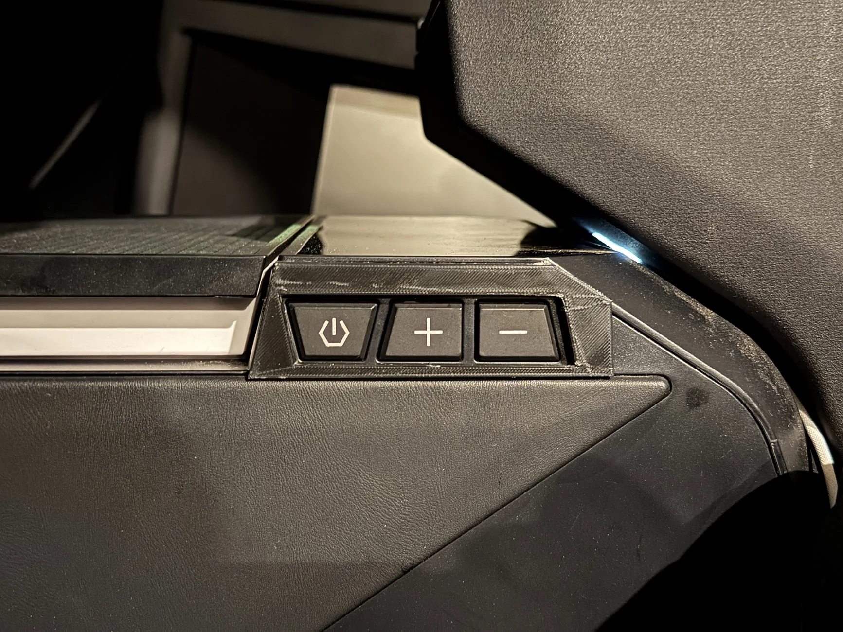 Tesla Cybertruck Tesstudio Cybertruck Cooler button fix for accidental knee bumps IMG_1036