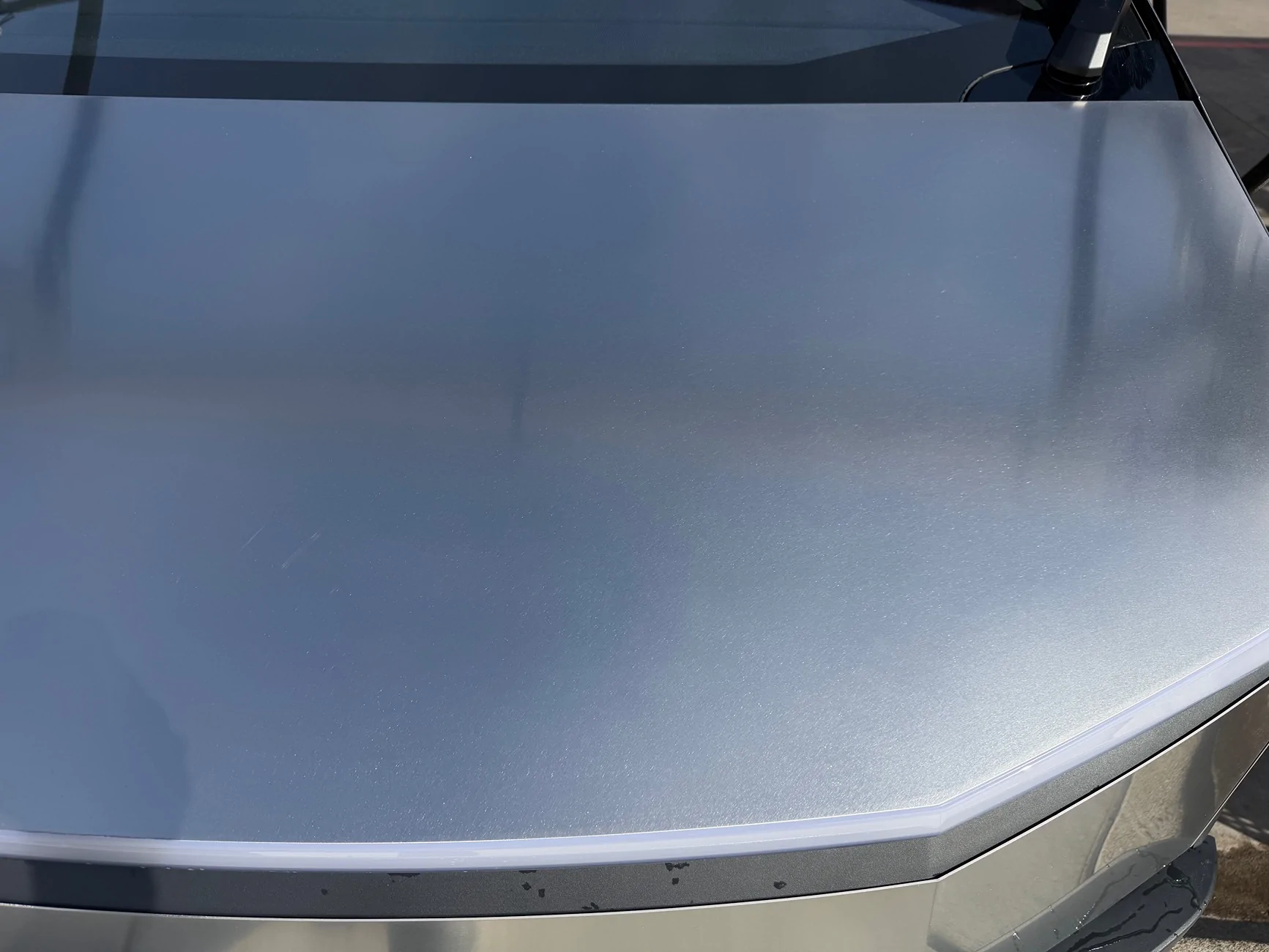 Tesla Cybertruck CyberSpots - spots on stainless steel IMG_9660