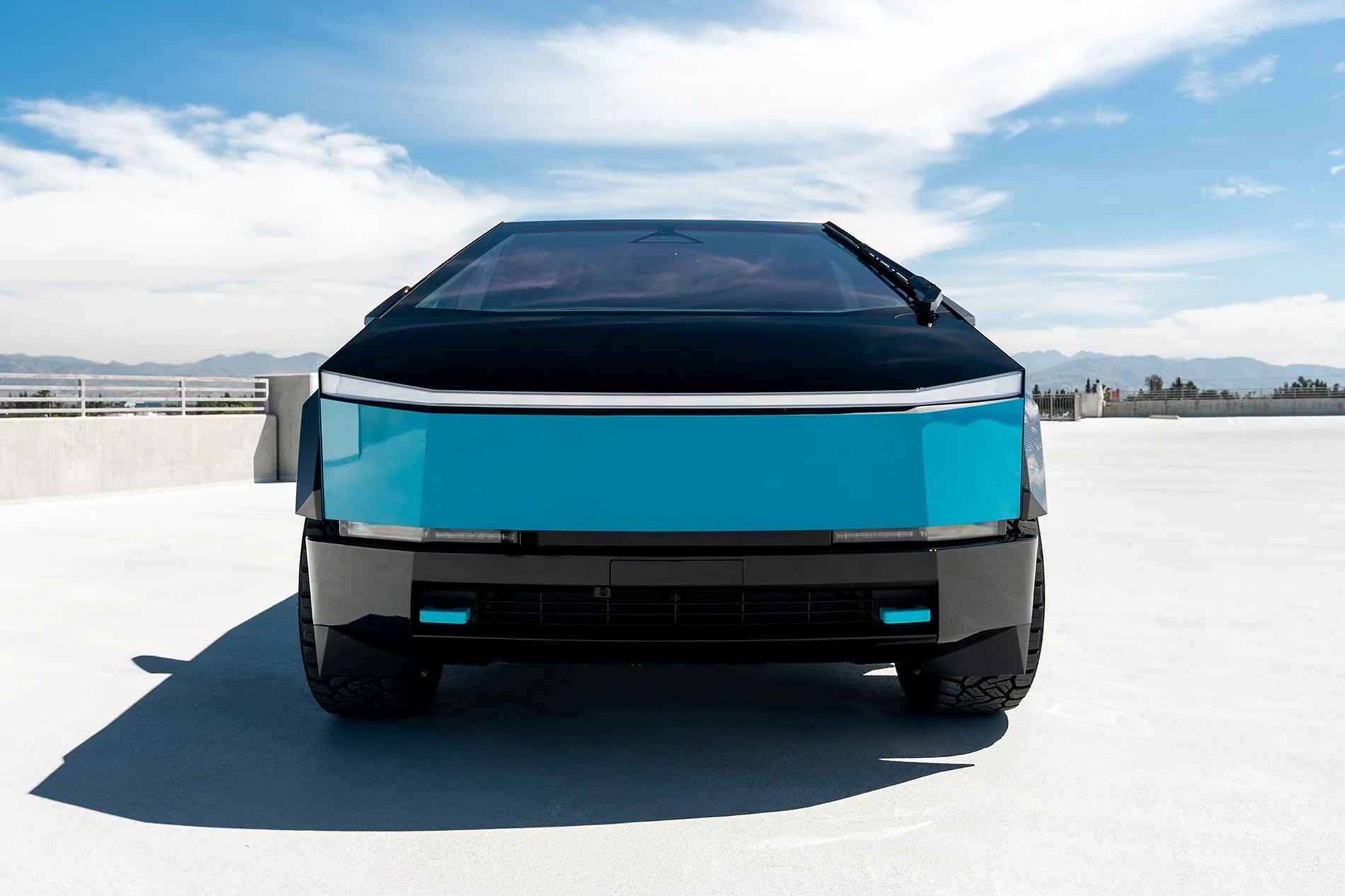 Tesla Cybertruck Two-Tone Miami Blue PPF on Cyber - with custom interior & body kit by T Sportline tmaxx-miami-blue-tesla-cybertruck-gloss-black-upper-24-inch-wheels-ctm-carbon-fiber-wide-body