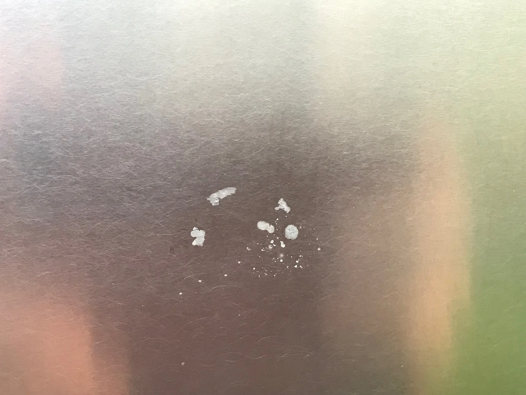 Tesla Cybertruck Magnetic sticker damage - how to restore stainless steel finish? IMG_6831