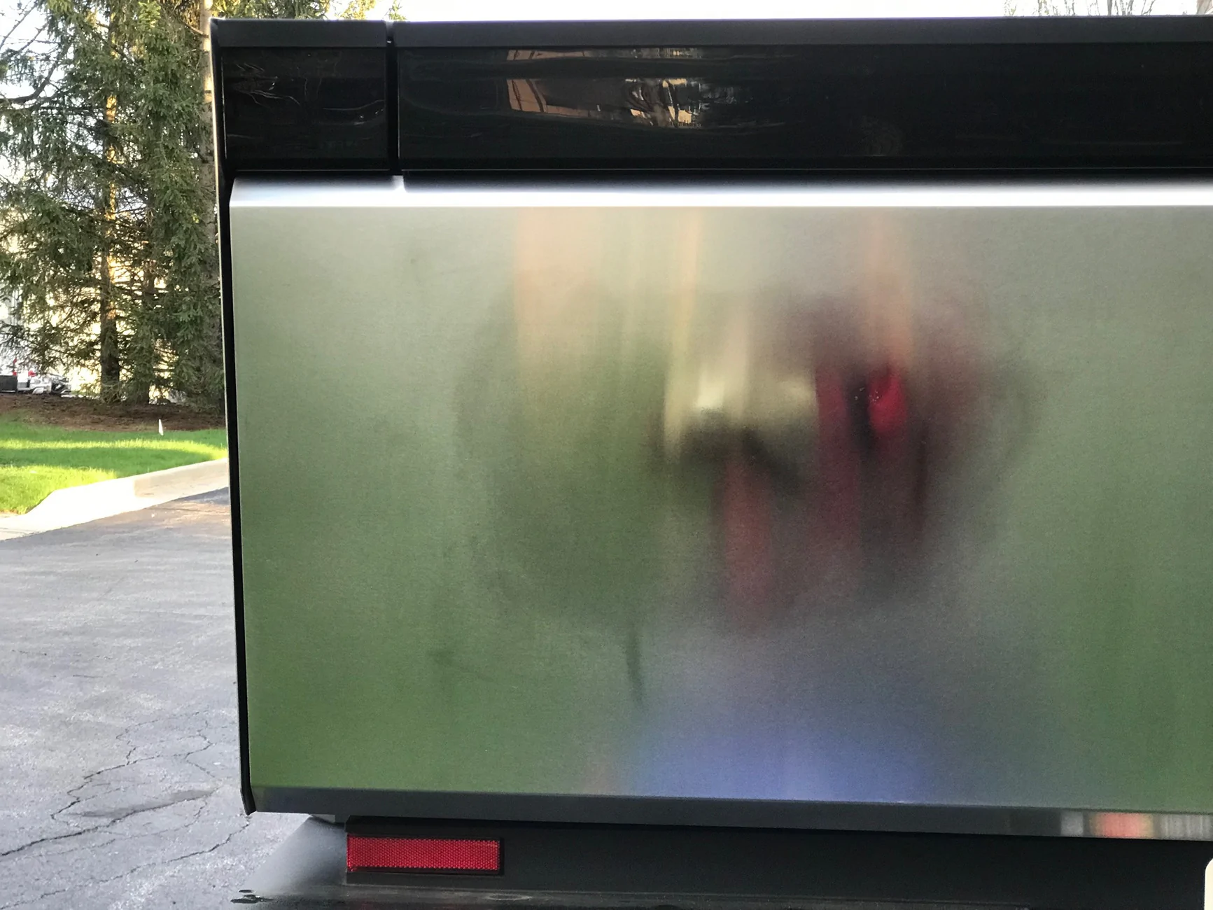 Tesla Cybertruck Magnetic sticker damage - how to restore stainless steel finish? IMG_6835