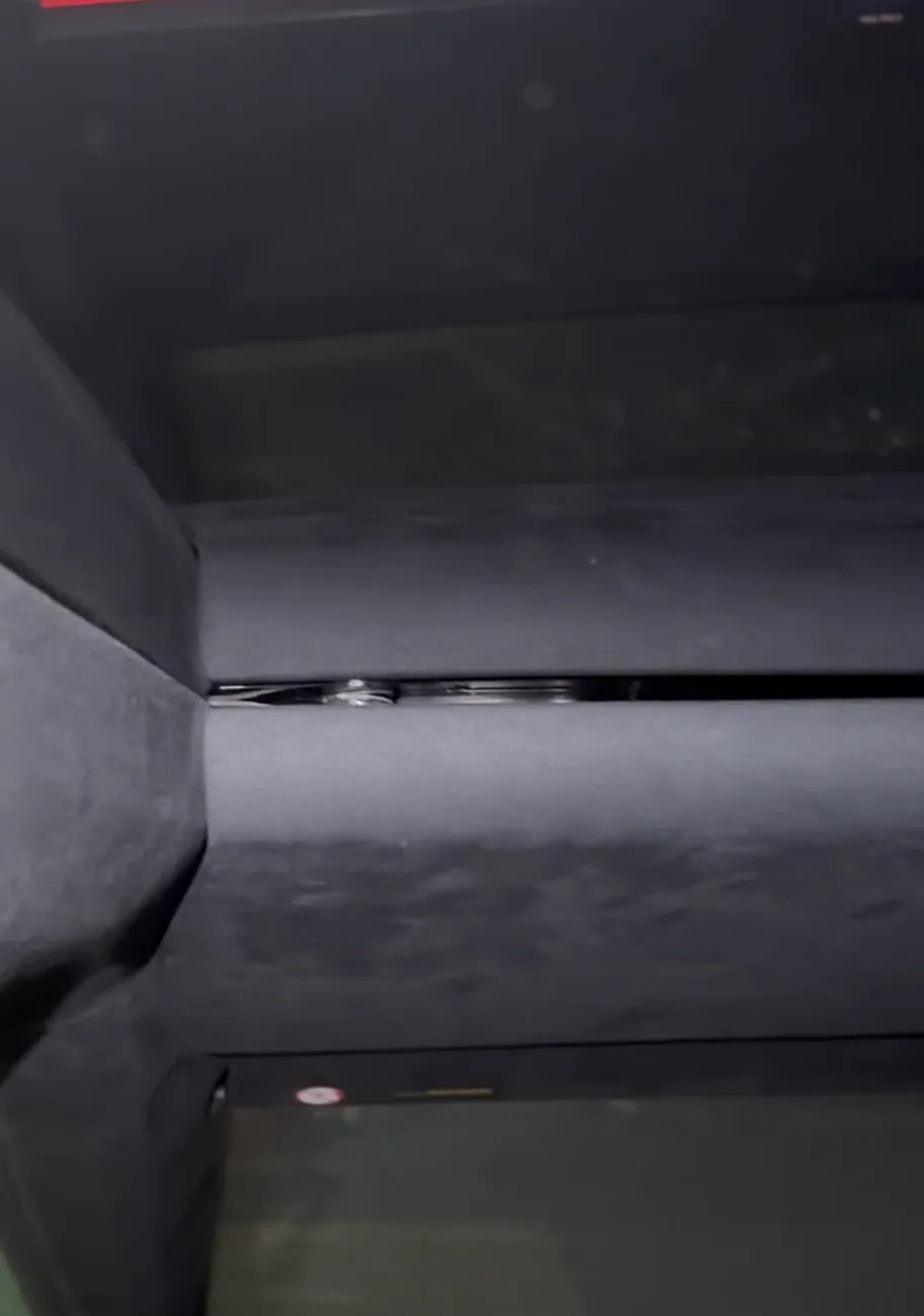Tesla Cybertruck Loose roof headliner trim and high pitch noises after windshield replacement IMG_4615
