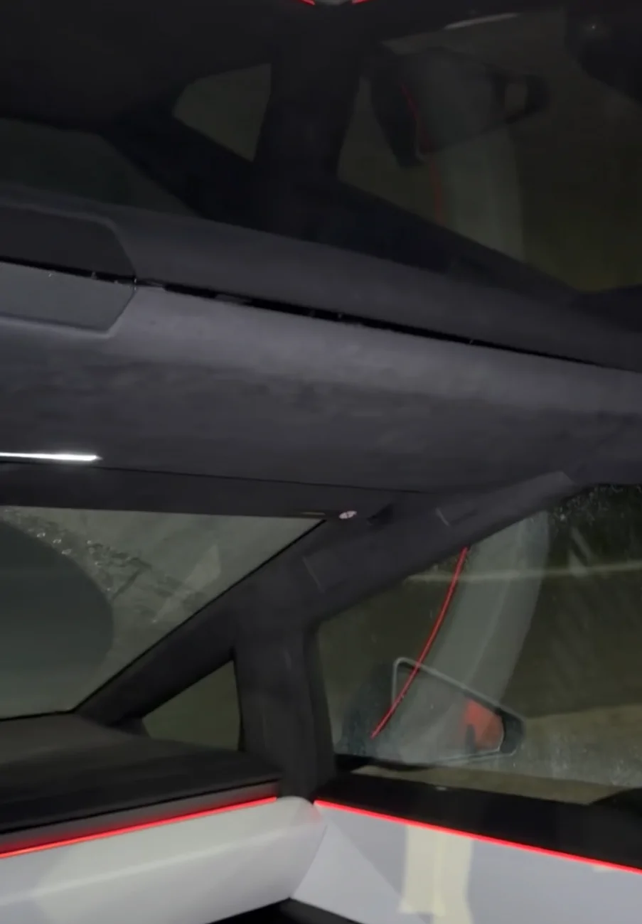 Tesla Cybertruck Loose roof headliner trim and high pitch noises after windshield replacement IMG_4616