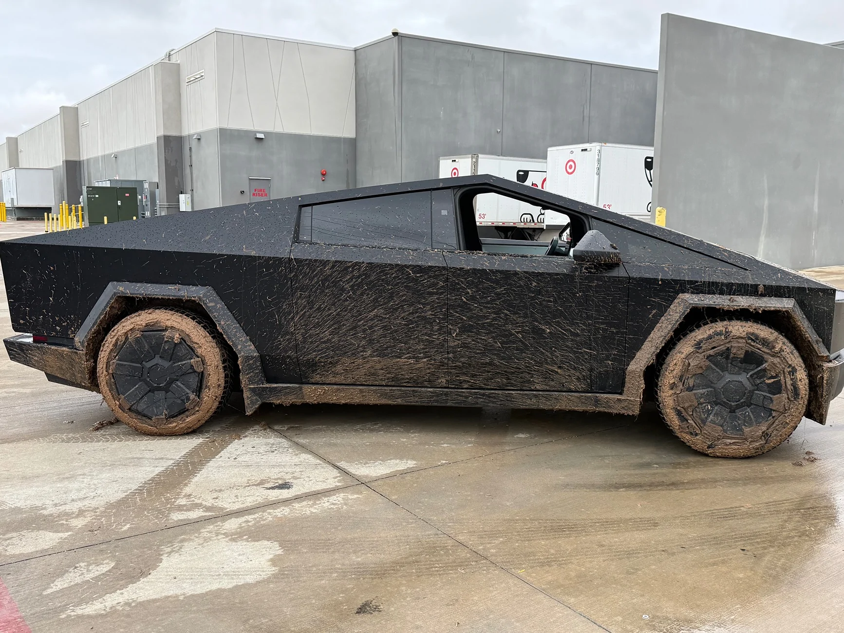 Tesla Cybertruck Rough rainy day in Houston today! Cybertruck got stuck. **video inside** IMG_3543