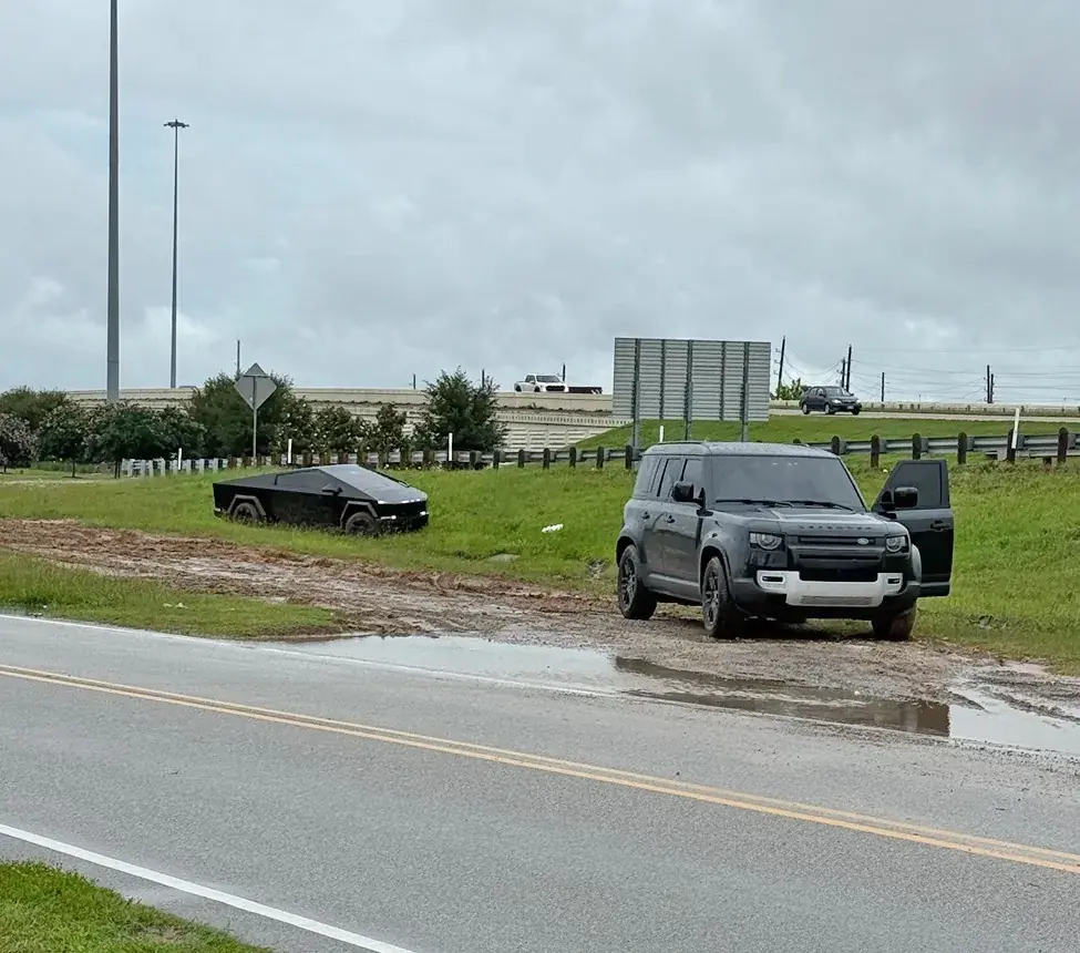 Tesla Cybertruck Rough rainy day in Houston today! Cybertruck got stuck. **video inside** 118643-48723a72c35af27ecceef19f93678e2