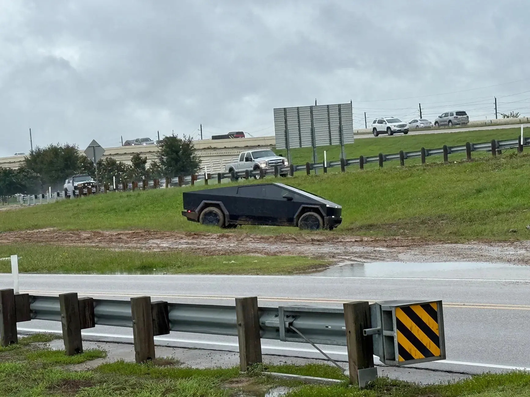 Tesla Cybertruck Rough rainy day in Houston today! Cybertruck got stuck. **video inside** 118642-ca2fe5f2c57b081f8eb3aa3956492379