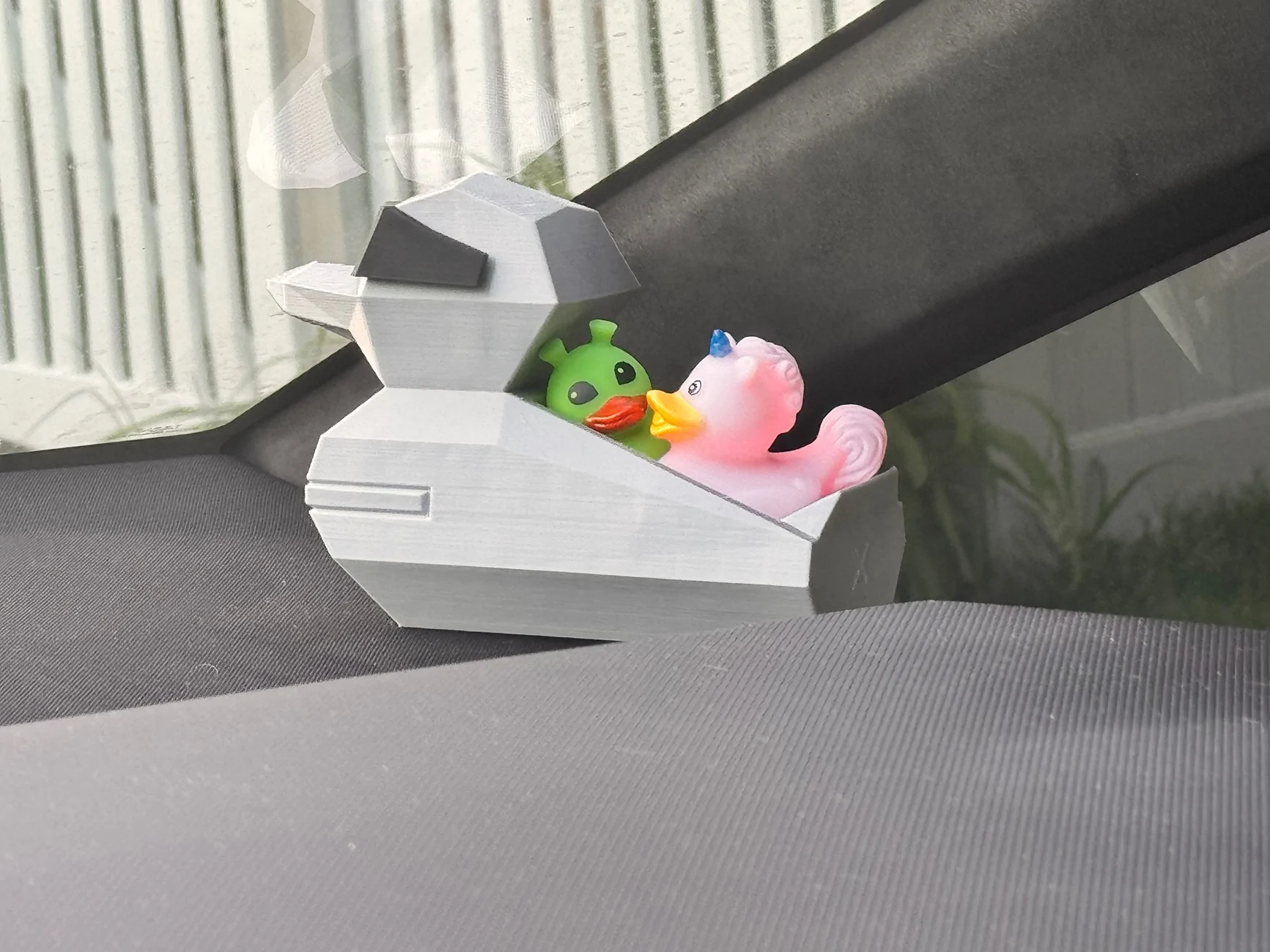 Tesla Cybertruck Jeep owners have silly ducks in the window IMG_1010