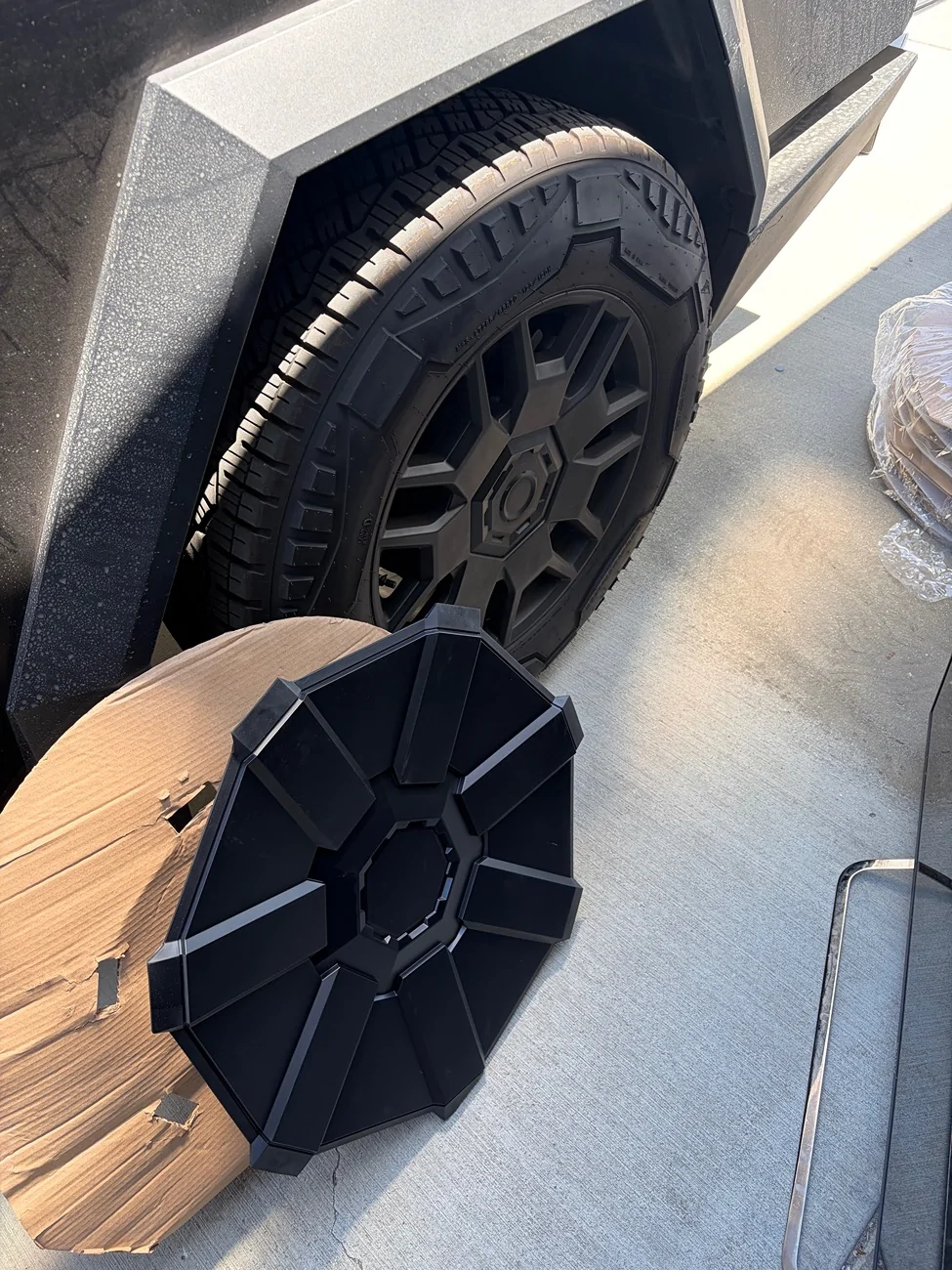 Tesla Cybertruck Am i doing this wrong or are these wheel covers not supposed to fit? IMG_1489