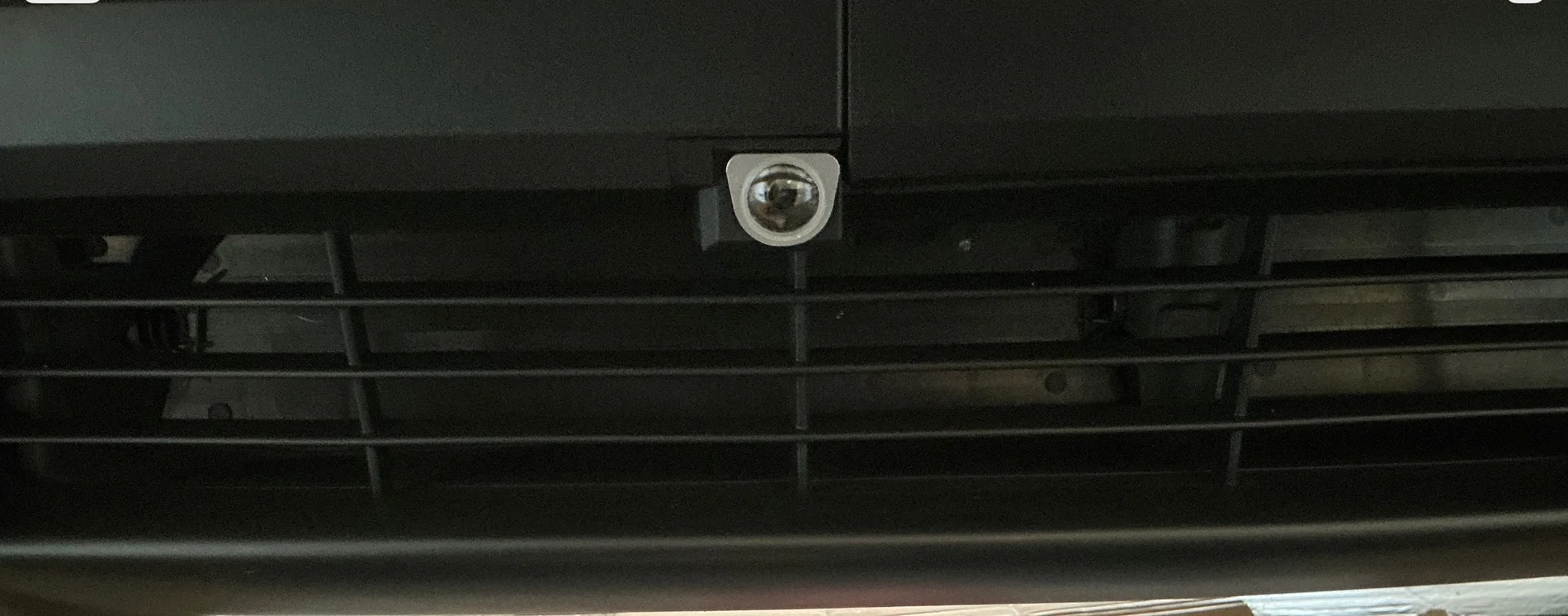 Tesla Cybertruck Chips in front camera lens IMG_2758