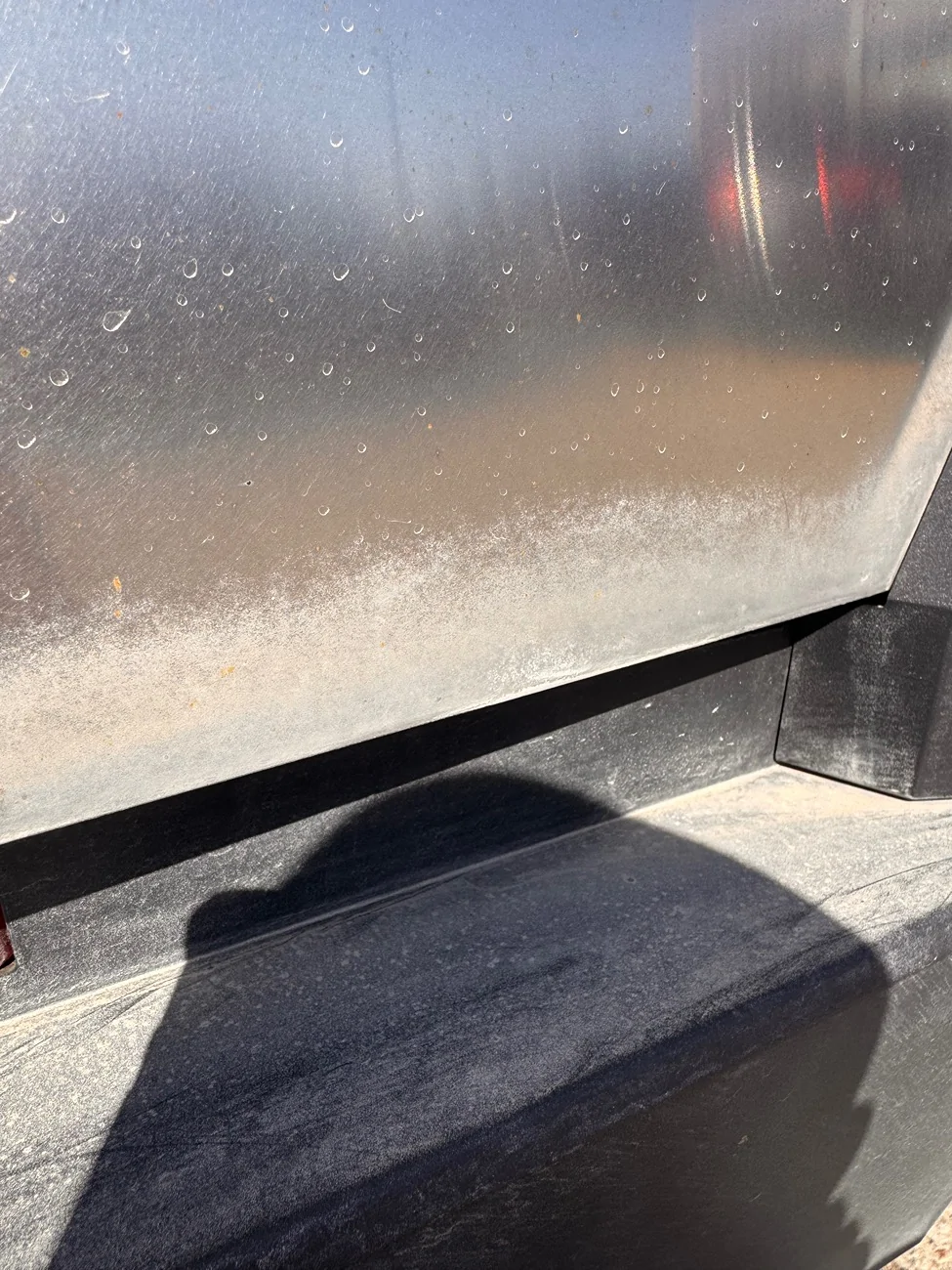 Tesla Cybertruck How to remove these salt stains after driving in winter? IMG_4417