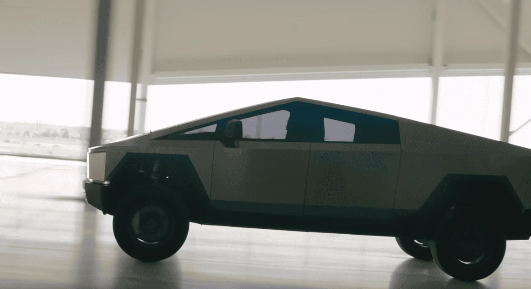 Tesla Cybertruck Cybertruck pic - in lowest air suspension mode & windows down 1653668249702