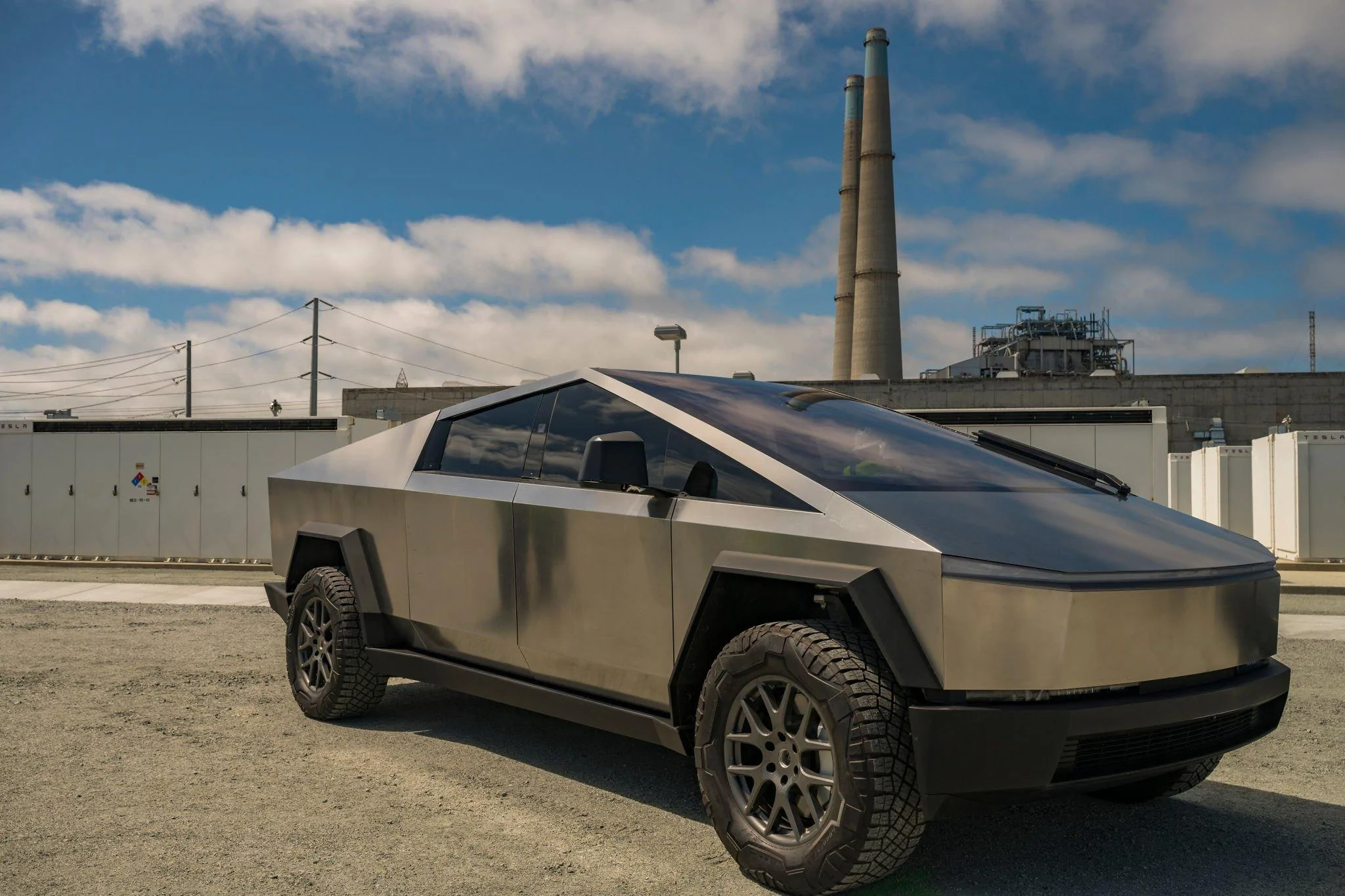 Tesla Cybertruck Cybertruck (w/ 2 piece windshield wiper) trotted out for Tesla's Moss Landing Megapack Battery System commissioning ceremony! 86566724_543381974182523_8279183834568114072_n-jpg