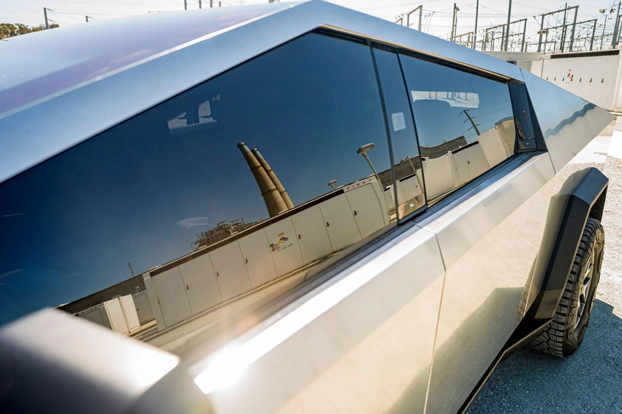 Tesla Cybertruck Cybertruck (w/ 2 piece windshield wiper) trotted out for Tesla's Moss Landing Megapack Battery System commissioning ceremony! 286506751_543381930849194_372254450249944032_n-jpg