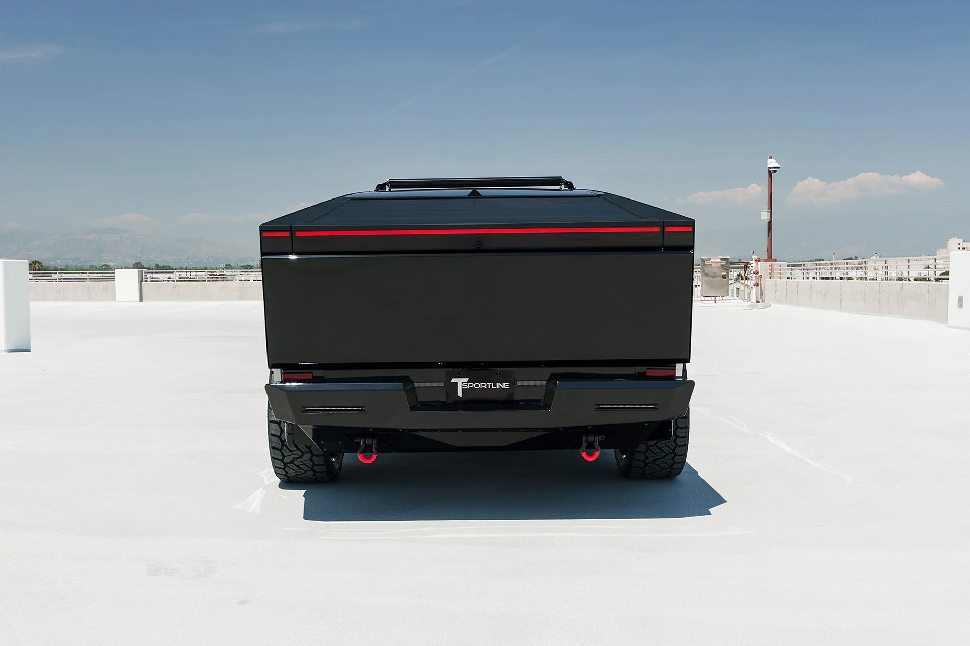 Tesla Cybertruck How to TOTALLY Black out your Cybertruck - This is it, one of the finest customs by T Sportline yet tmaxx-gloss-hyper-black-tesla-cybertruck-ctx-off-road-bumper-led-lightbar-pods-1920-10