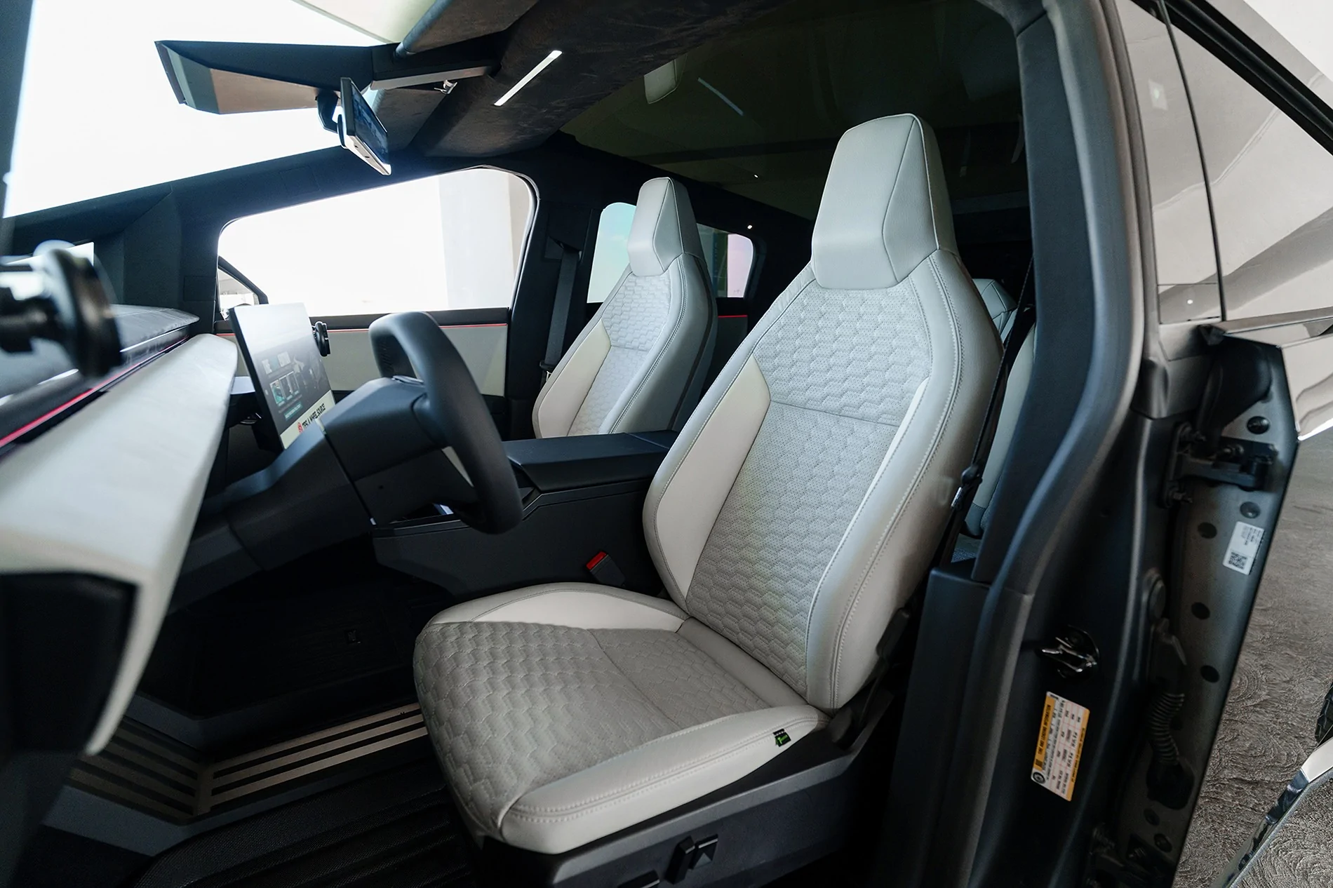 Tesla Cybertruck How to TOTALLY Black out your Cybertruck - This is it, one of the finest customs by T Sportline yet tesla-cybertruck-custom-interior-upholstery-cement-gray-1920-1