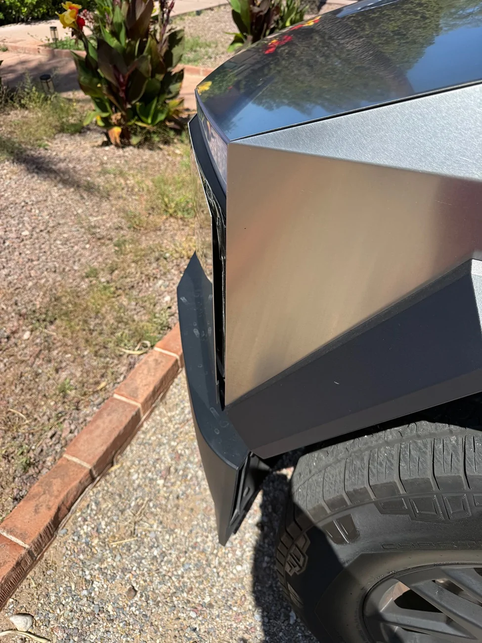 Tesla Cybertruck Partial delamination front stainless IMG_1092