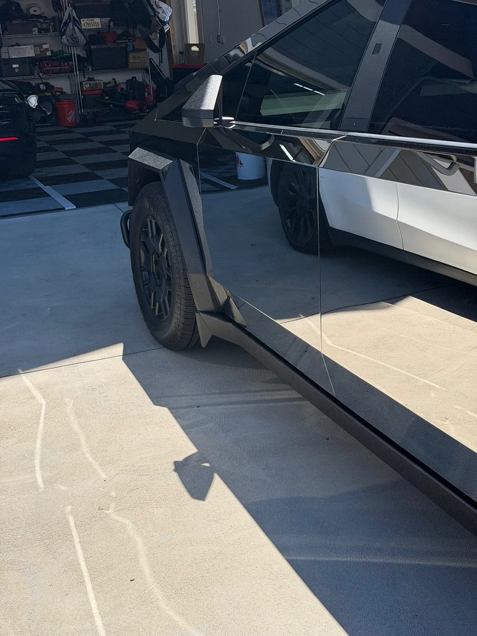 Tesla Cybertruck Plastic sliders not looking so good IMG_0492