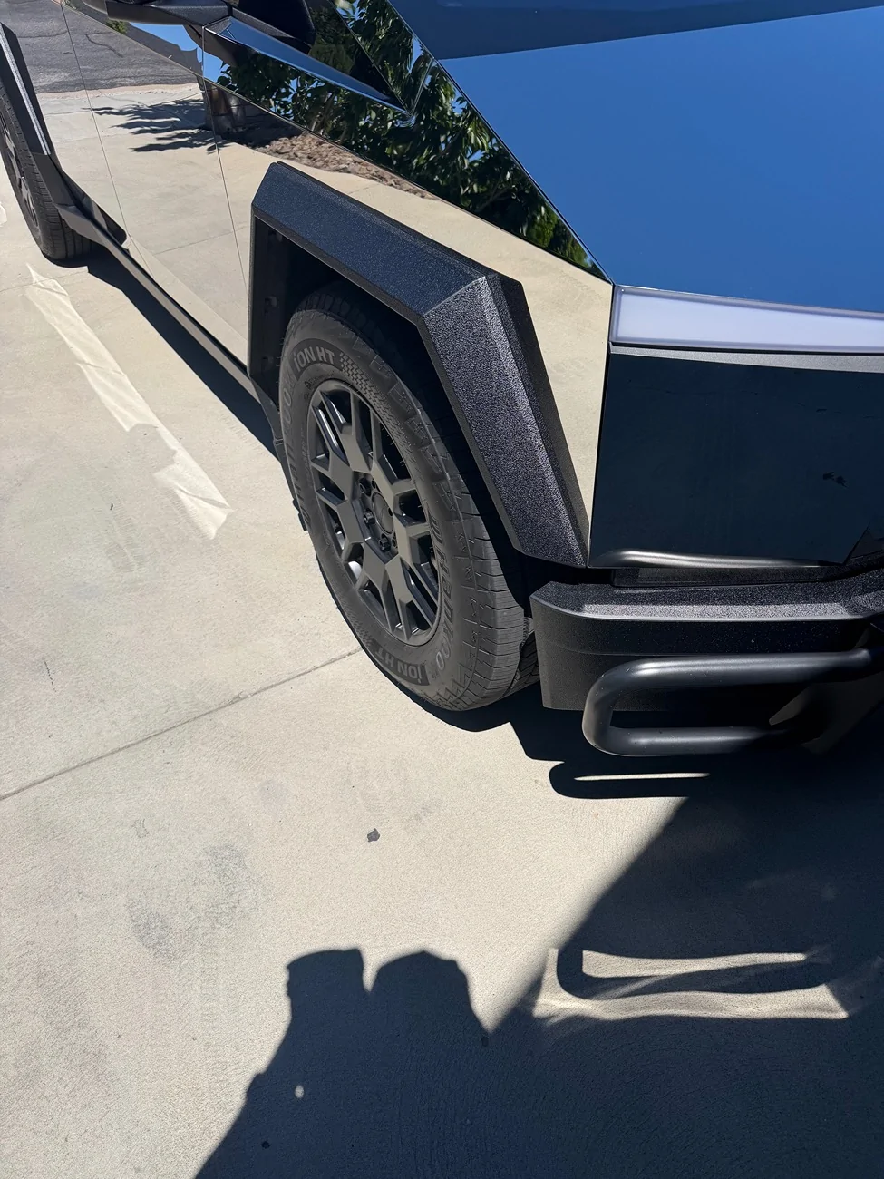 Tesla Cybertruck Plastic sliders not looking so good IMG_0488