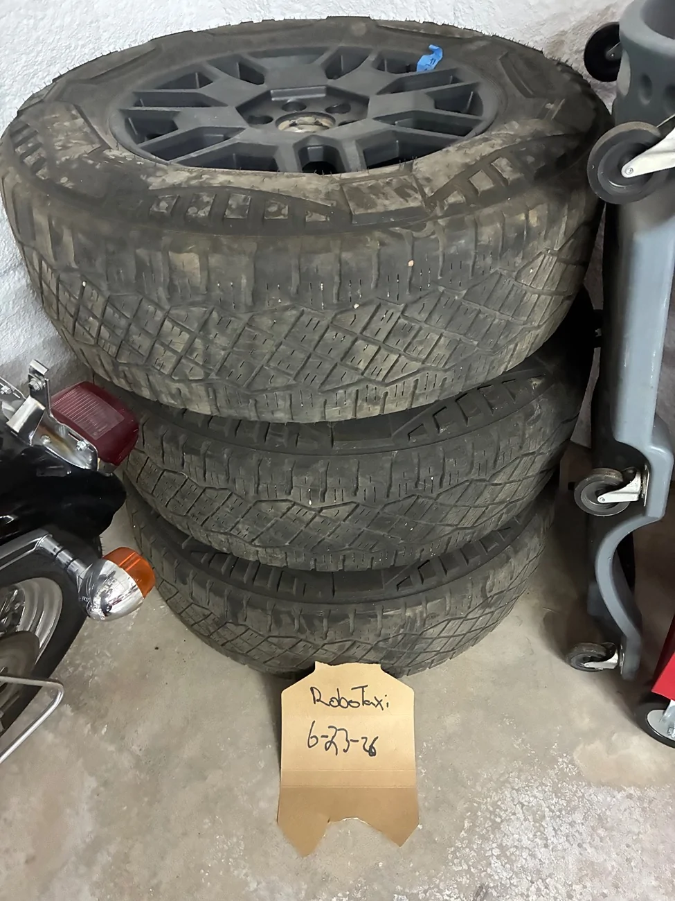 Tesla Cybertruck 4 20” cyber wheels with worn tires. IMG_6101