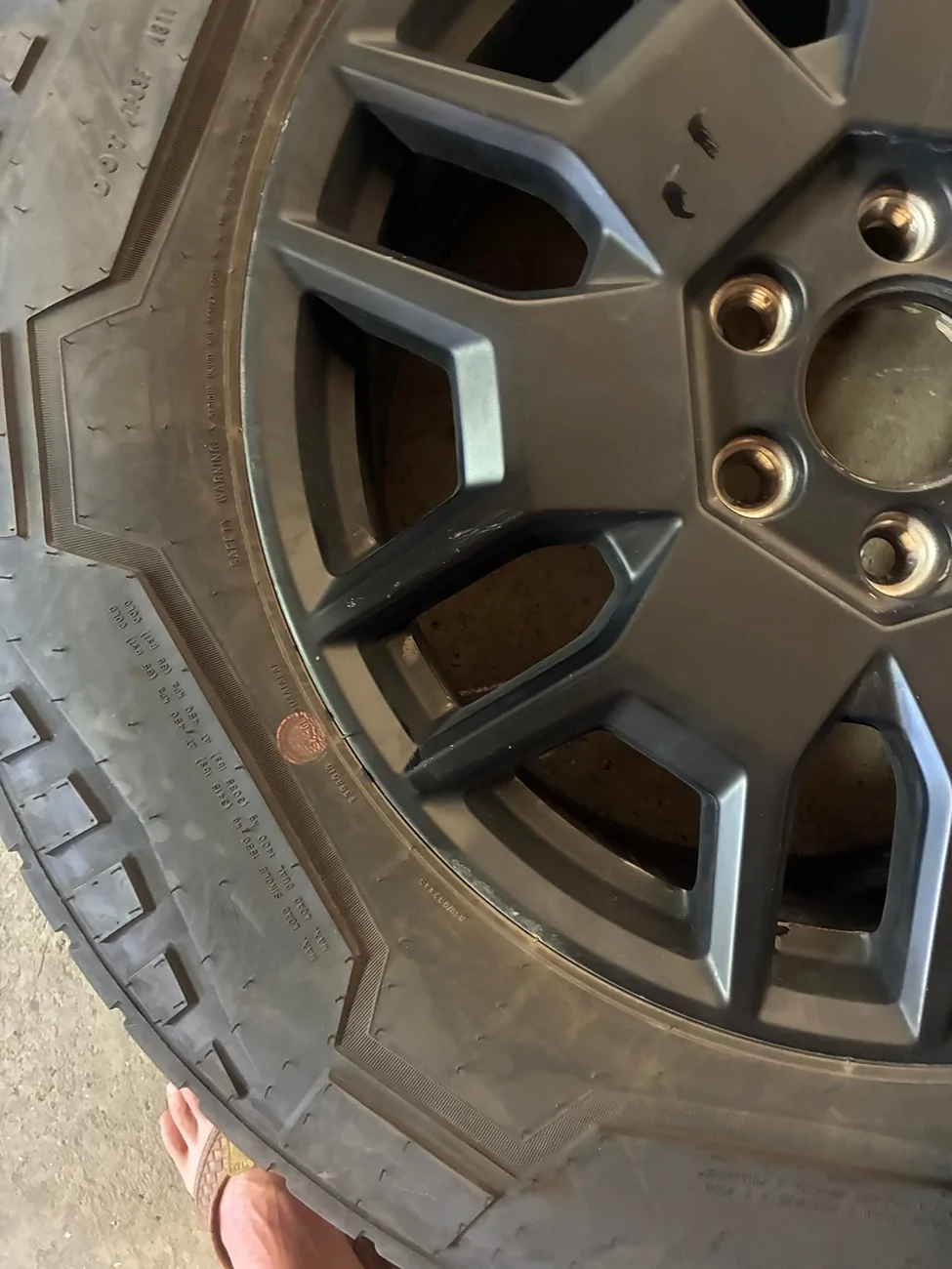 Tesla Cybertruck 4 20” cyber wheels with worn tires. IMG_6106
