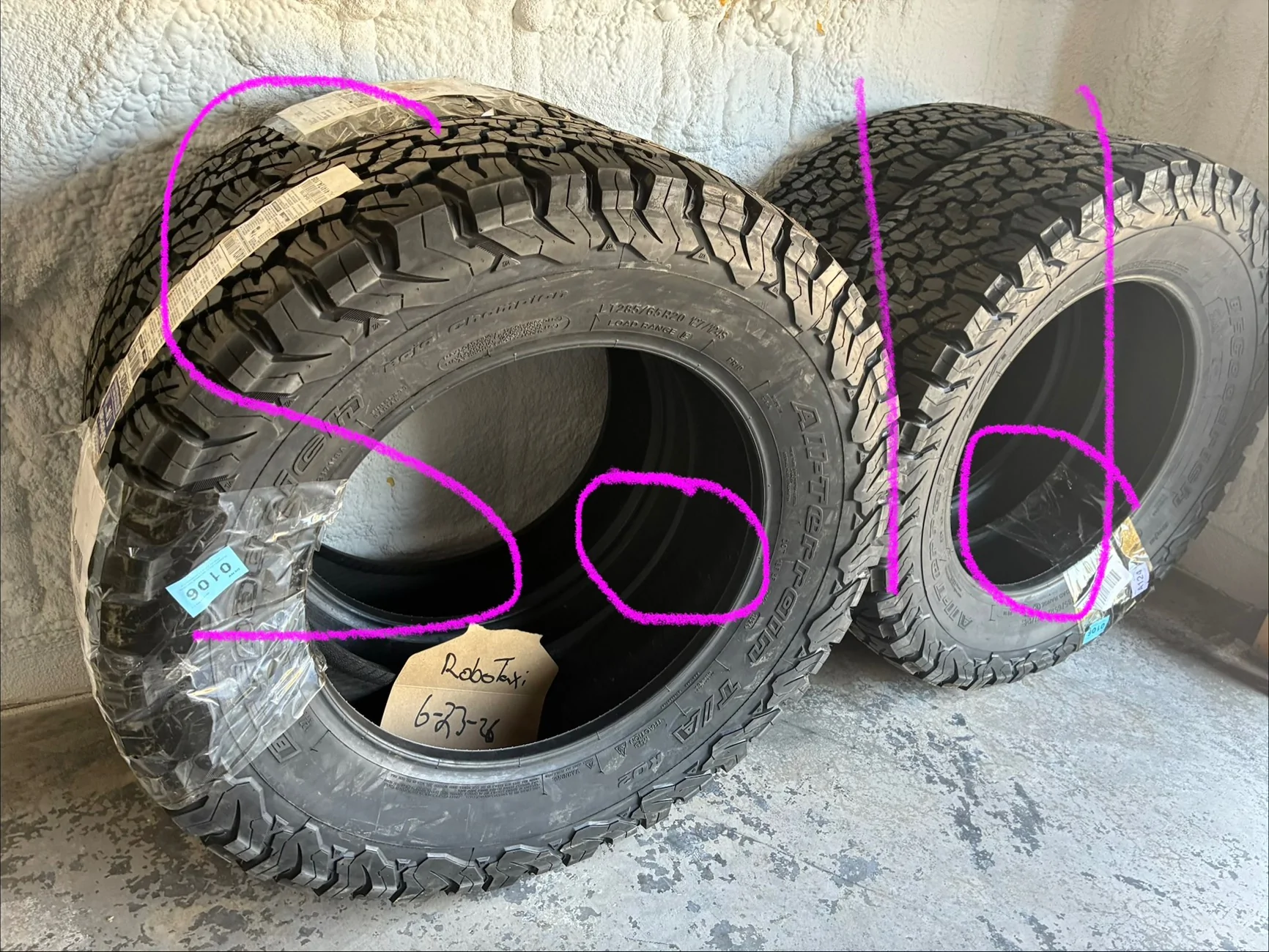 Tesla Cybertruck 4 20” cyber wheels with worn tires. IMG_6102