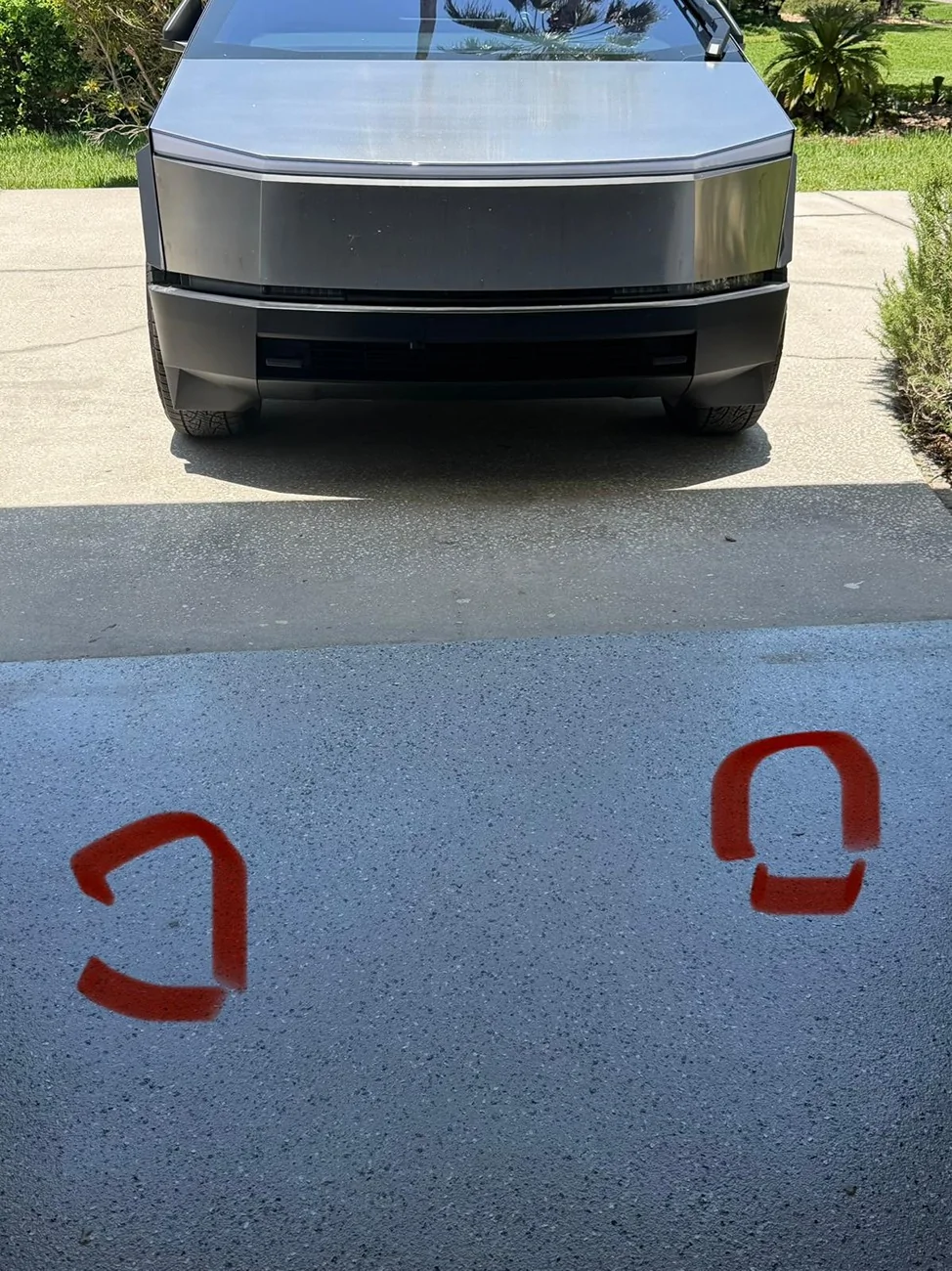 Tesla Cybertruck Cybertruck (3 Months Old, 4,000 Miles) – Oil Drips Near Both Rear Wheels Every Morning. Safe to Drive? oil drip 2