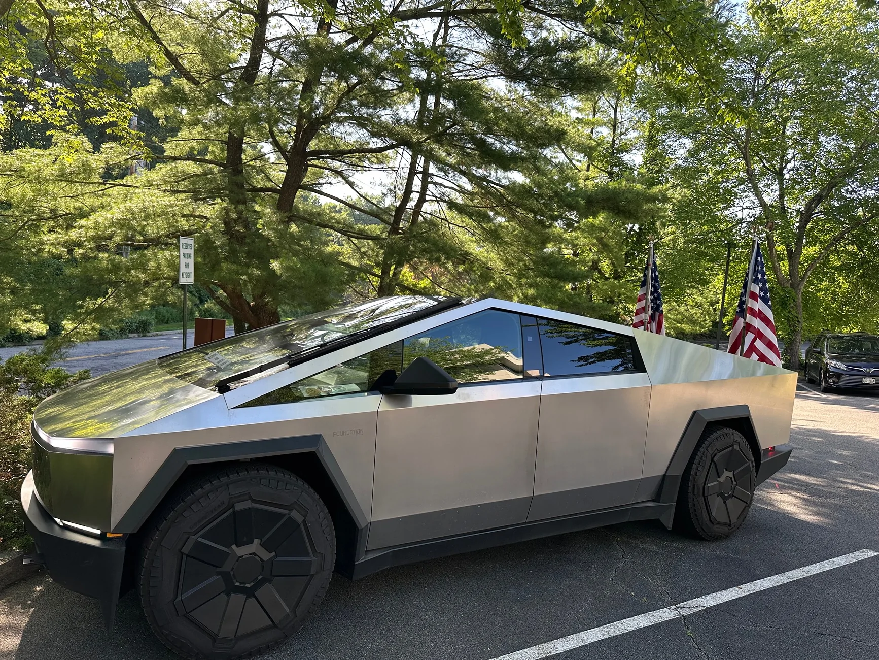 Tesla Cybertruck Flying American flags on Cybertruck - a solution using bed divider IMG_2233