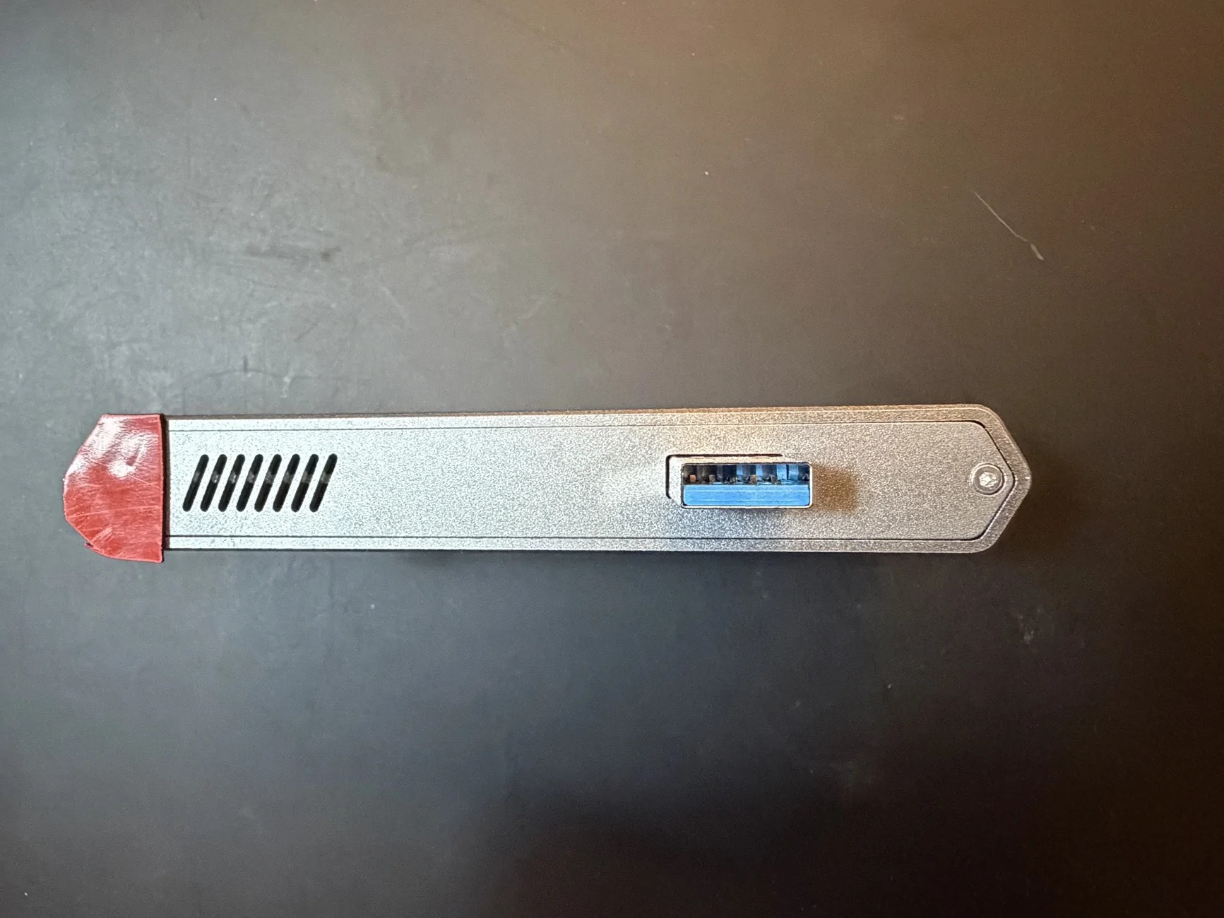 Tesla Cybertruck Anyone use the Tesla Solid State Drive | 1 TB on CT? Backside with Tape_Avoiding Vents 