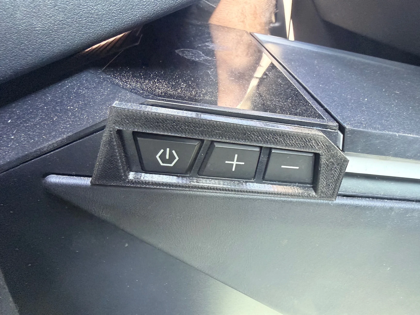 Tesla Cybertruck Tesstudio Cybertruck Cooler button fix for accidental knee bumps IMG_2649