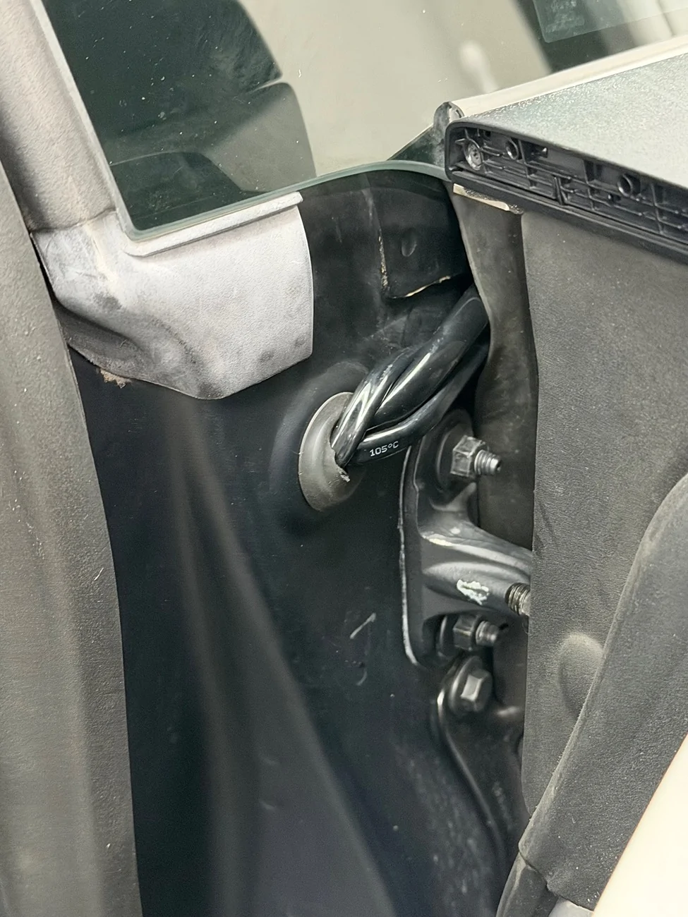 Tesla Cybertruck Routing wire from aux lighting switch in frunk to the cabin IMG_0382