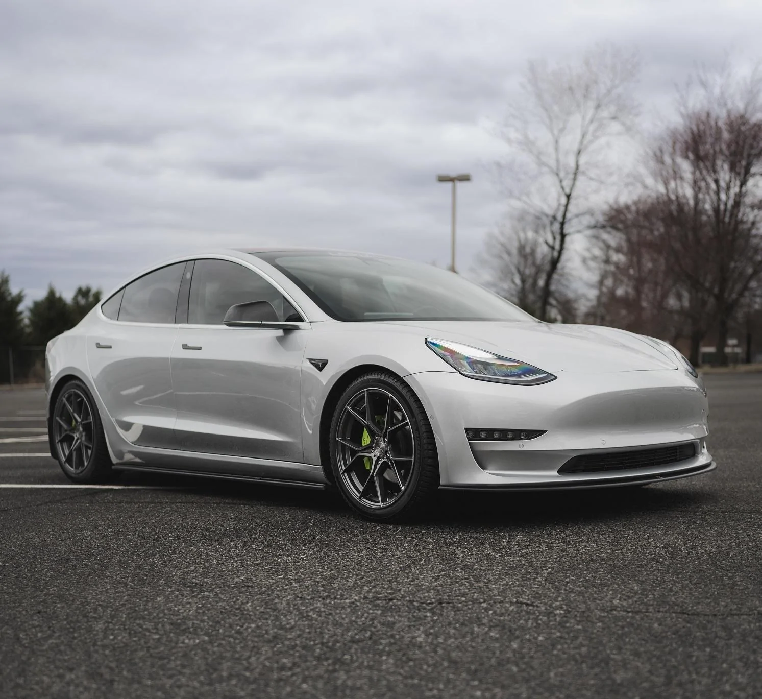Tesla Cybertruck Cybertruck pic - in lowest air suspension mode & windows down J1
