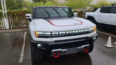 Tesla Cybertruck GM Hummer vs Tesla Cybertruck - Complete Review. a57-ac7c-af5ba8ae6bf1-GMCHummerEV_3-wipers_480x480