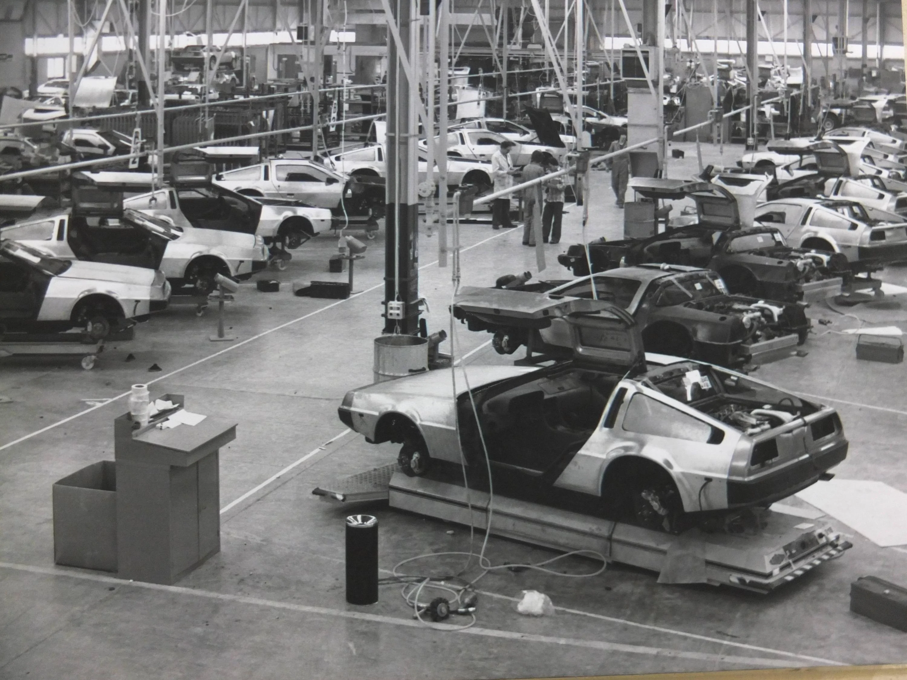 Tesla Cybertruck Unconfirmed: Cybertruck Exoskeleton Machine Press arrives in Texas DeLorean-DMC-12-Factory-2