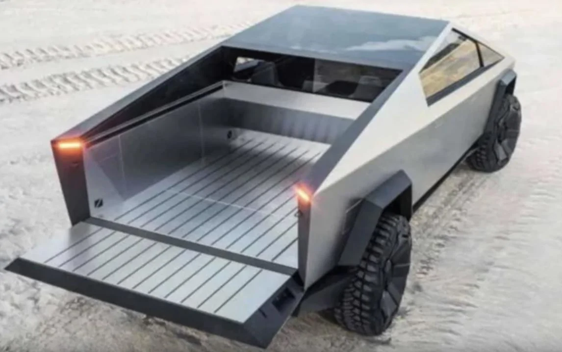 Tesla Cybertruck New Cybertruck video clip (from Cyber Rodeo 2022). Shows tail lights & reverse lights 4FE4B9EE-3C3A-4621-BC58-1297997970E9