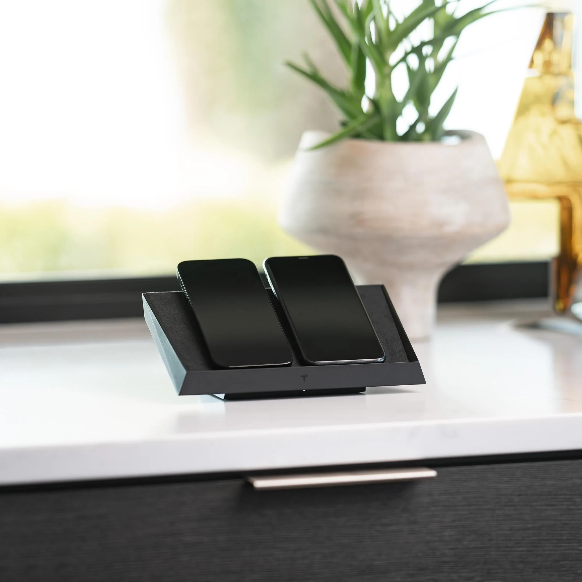 Tesla Cybertruck Tesla launches Cybertruck design inspired wireless charger 1799799-00-A_1_2000