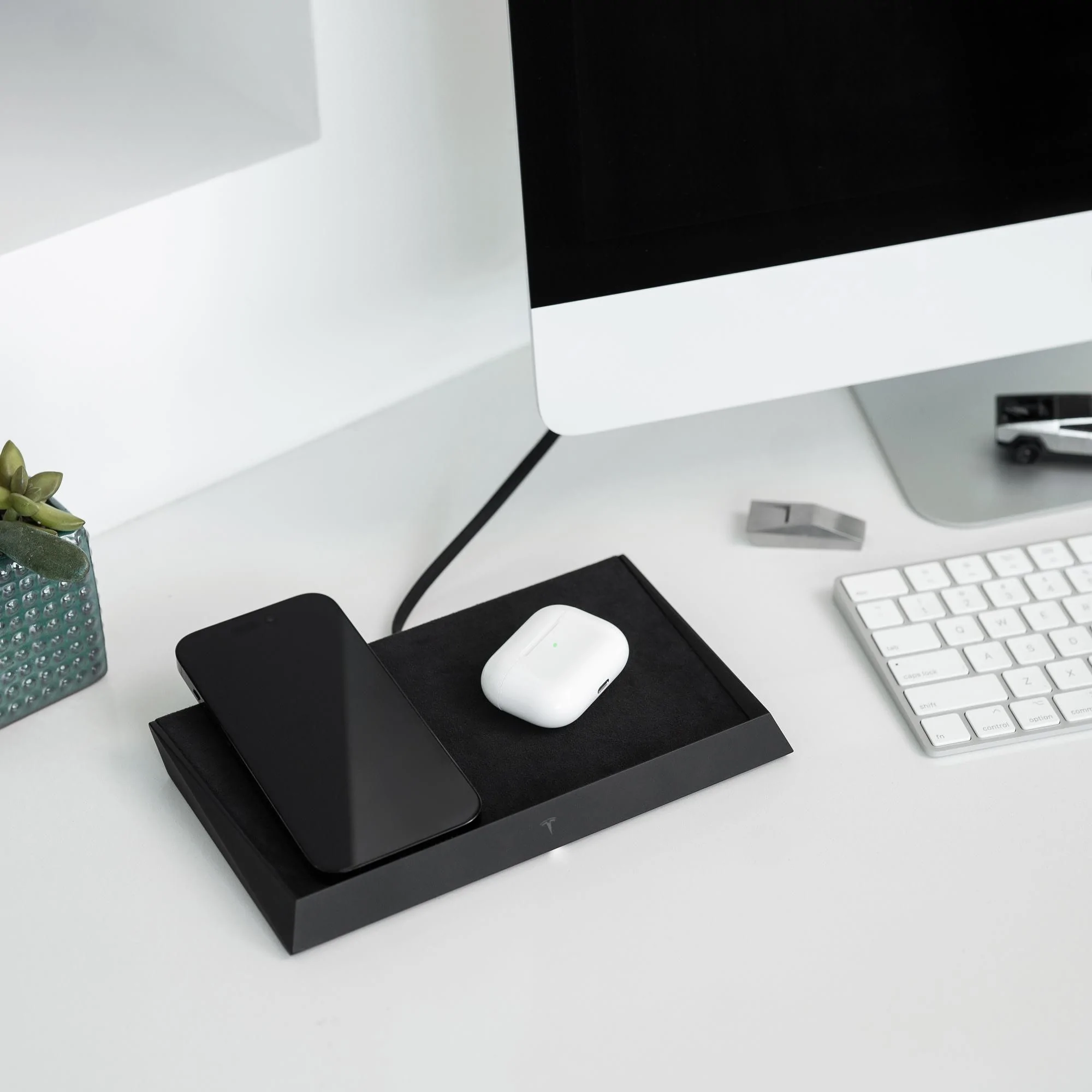 Tesla Cybertruck Tesla launches Cybertruck design inspired wireless charger 1799799-00-A_2_2000