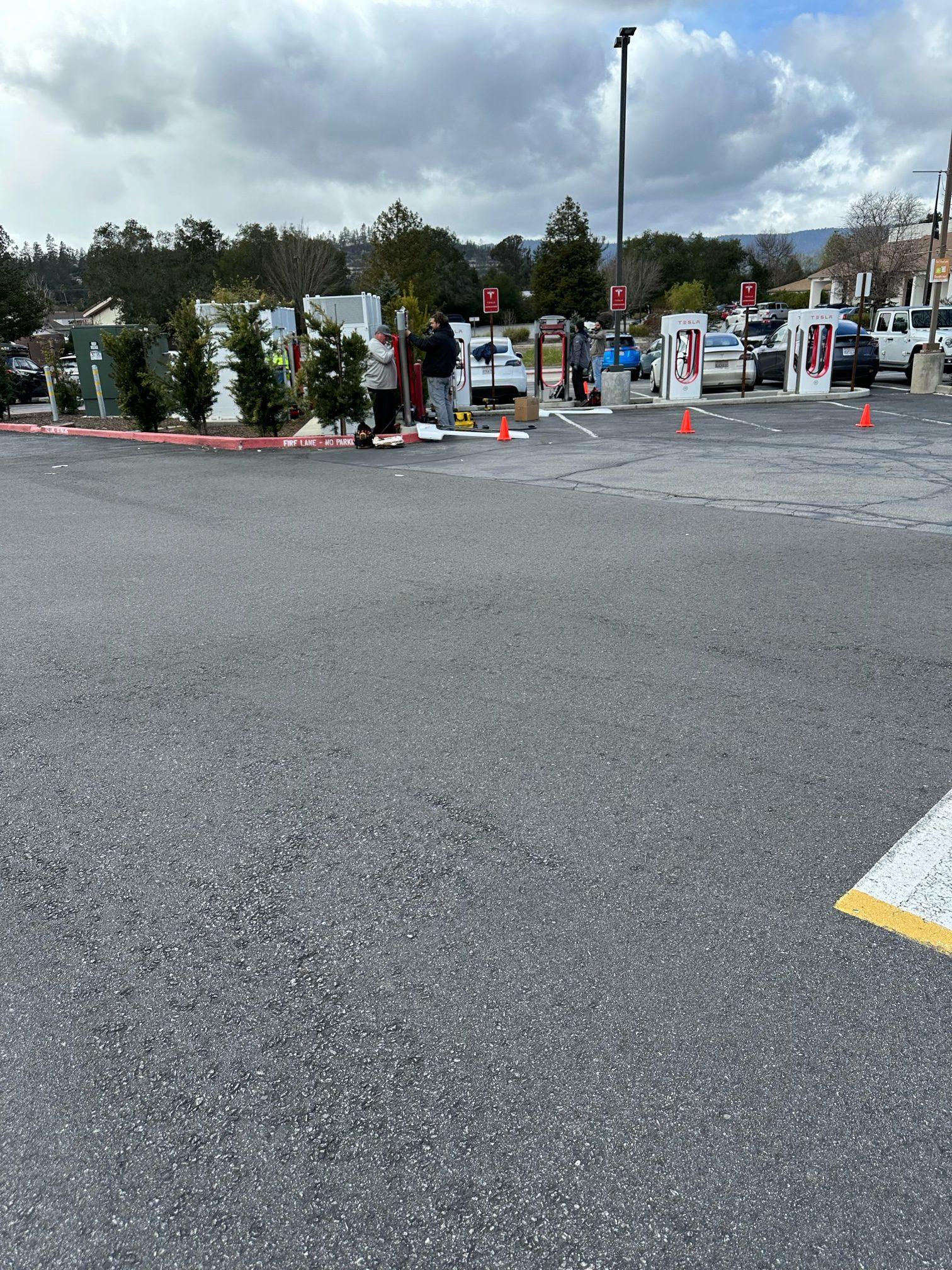 Tesla Cybertruck First Supercharger with Magic Dock CCS Adapter charges up a Rivian tesla 2