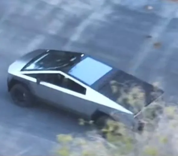 Tesla Cybertruck Aerial footage of Cybertruck driving!! 🚁 (w/ tonneau cover closed) Screenshot_20230225_152735_Twitter