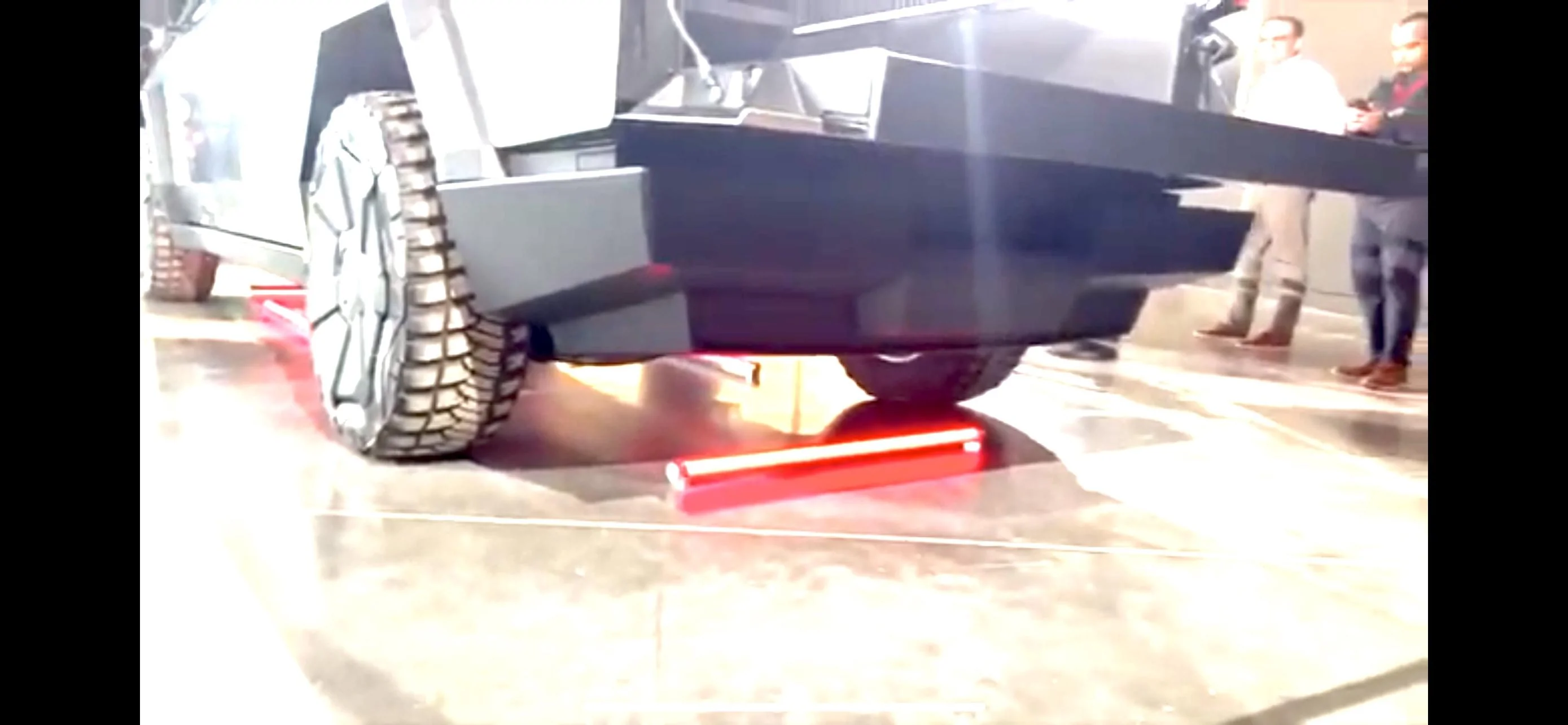 Tesla Cybertruck What is this wedge looking piece coming off the side of tail gate ? 372DEDF9-4B61-4FB2-9BD4-64816D606DE3